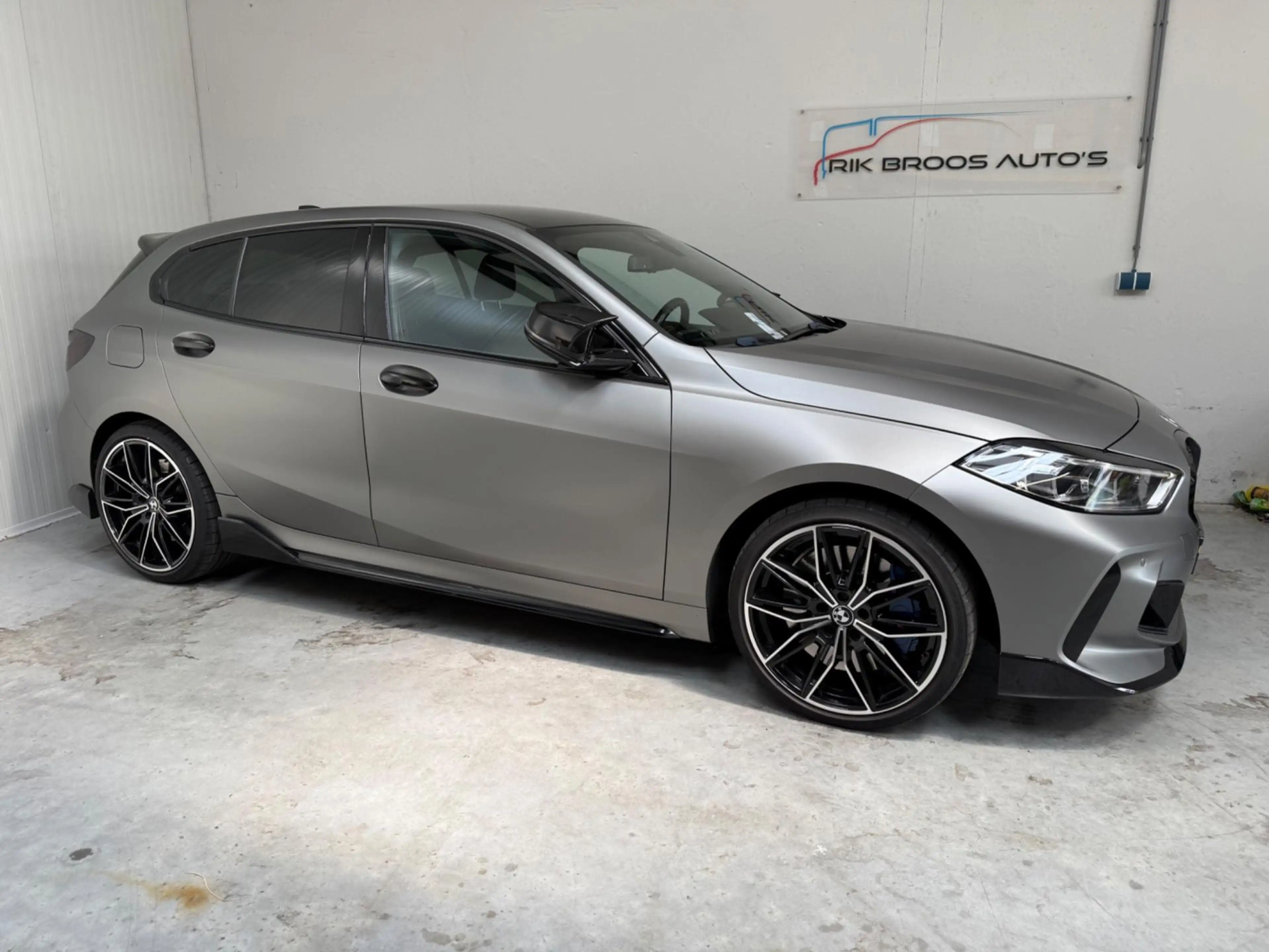 BMW 135 1-serie M135i xDrive High Executive — photo 2