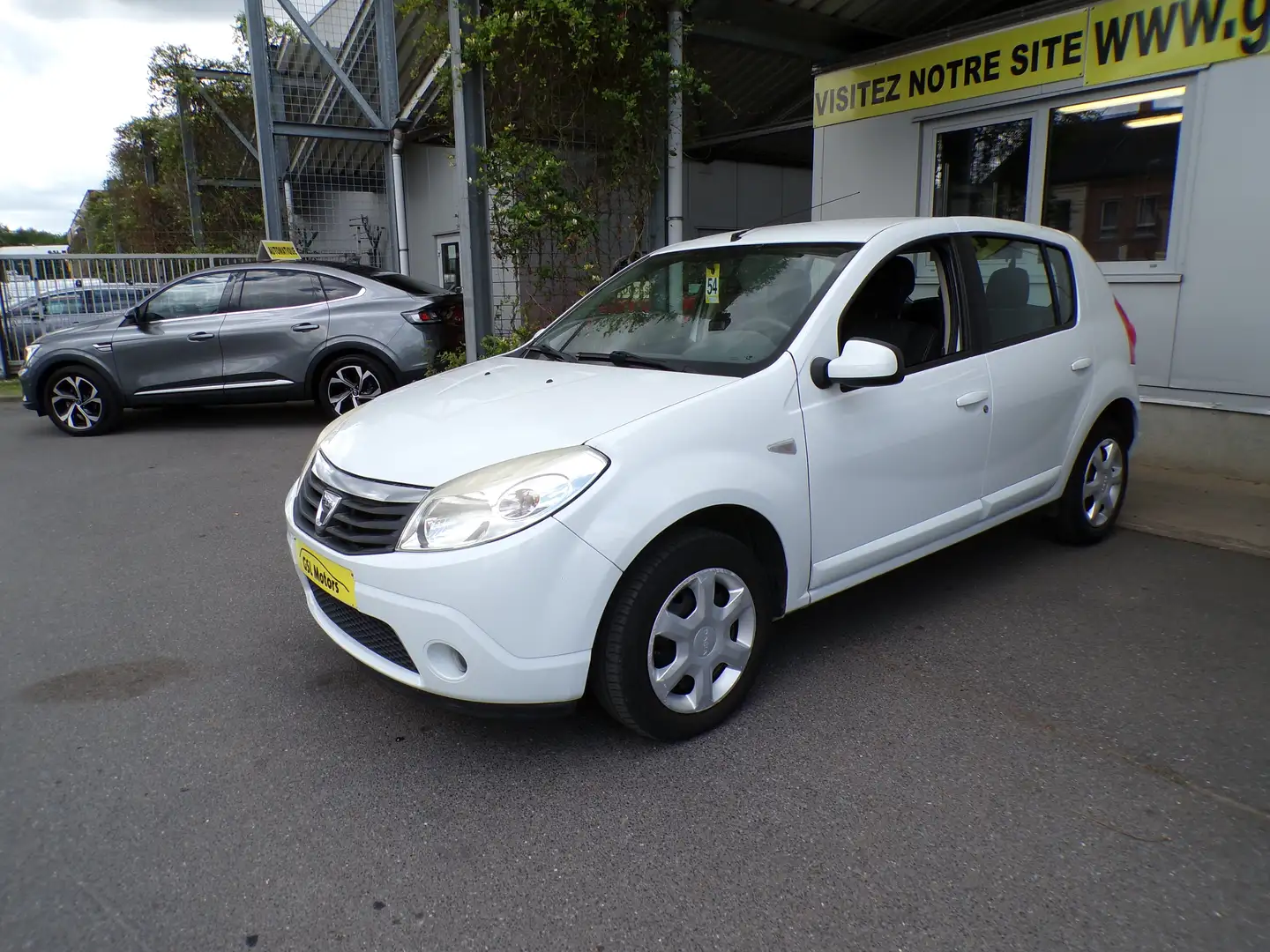 Dacia Sandero 1.1i 75cv blanc 04/12 61.533km 1ere main Airco USB Blanc - 1