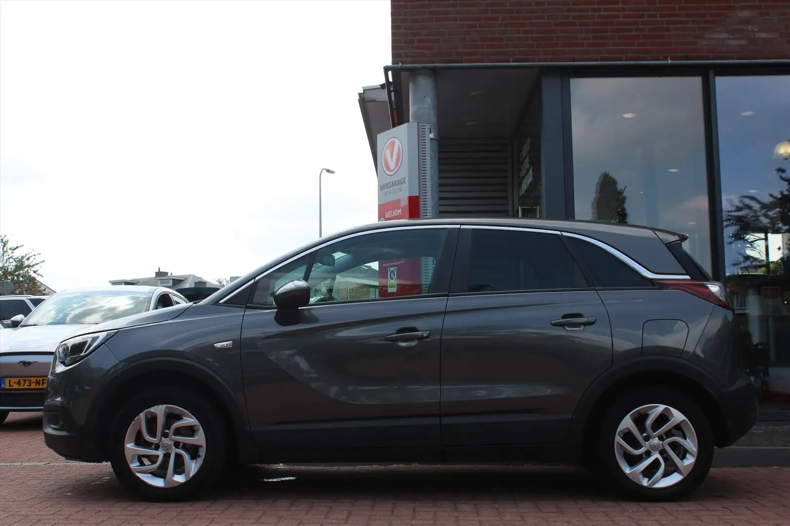 Opel Crossland X 1.2 Turbo *Edition* | Carplay | Cruise & Climate C Grijs - 2