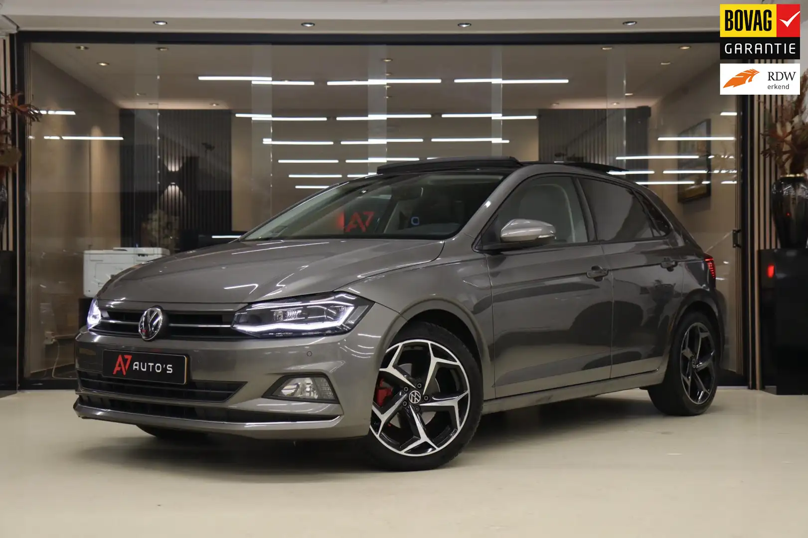 Volkswagen Polo 1.0 TSI Highline NAP/PANO/VIRTUAL/CARPLAY/BEATSSOU Grijs - 1
