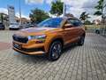 Skoda Karoq Tour 1.5 16V TSI ACT #7-Gang-DSG Pomarańczowy - thumbnail 2