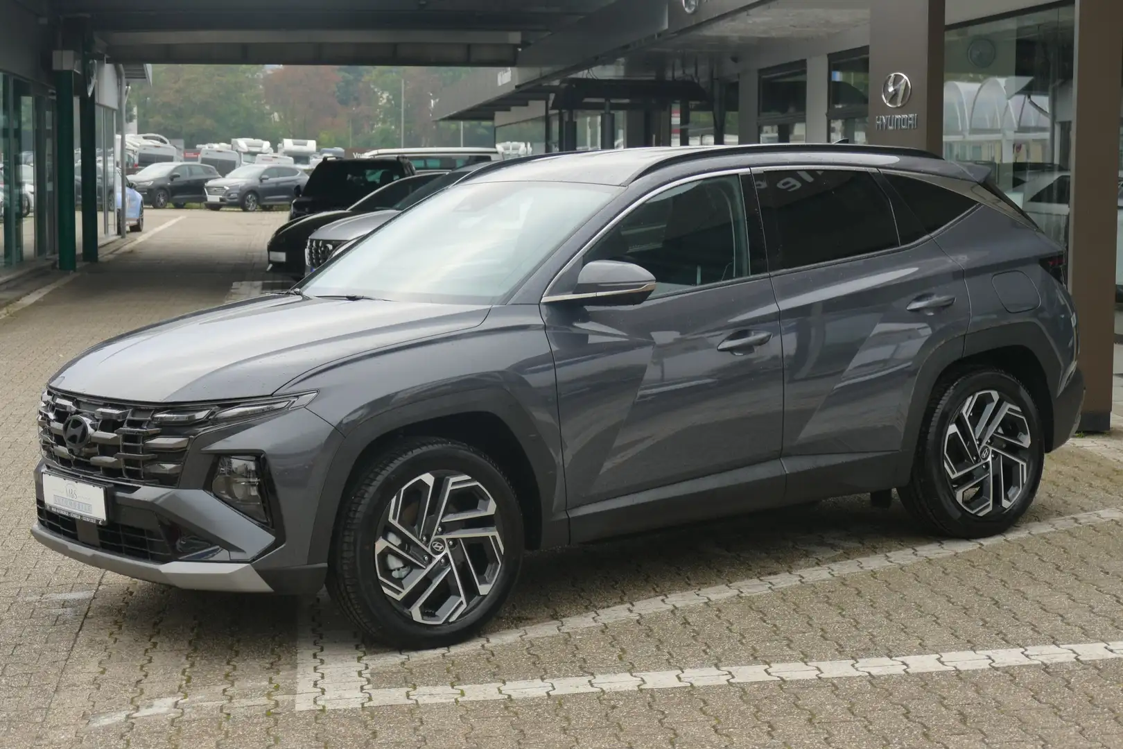 Hyundai TUCSON 1.6 T-GDi Plug-in-Hybrid 4WD Prime*MJ25* Grau - 1