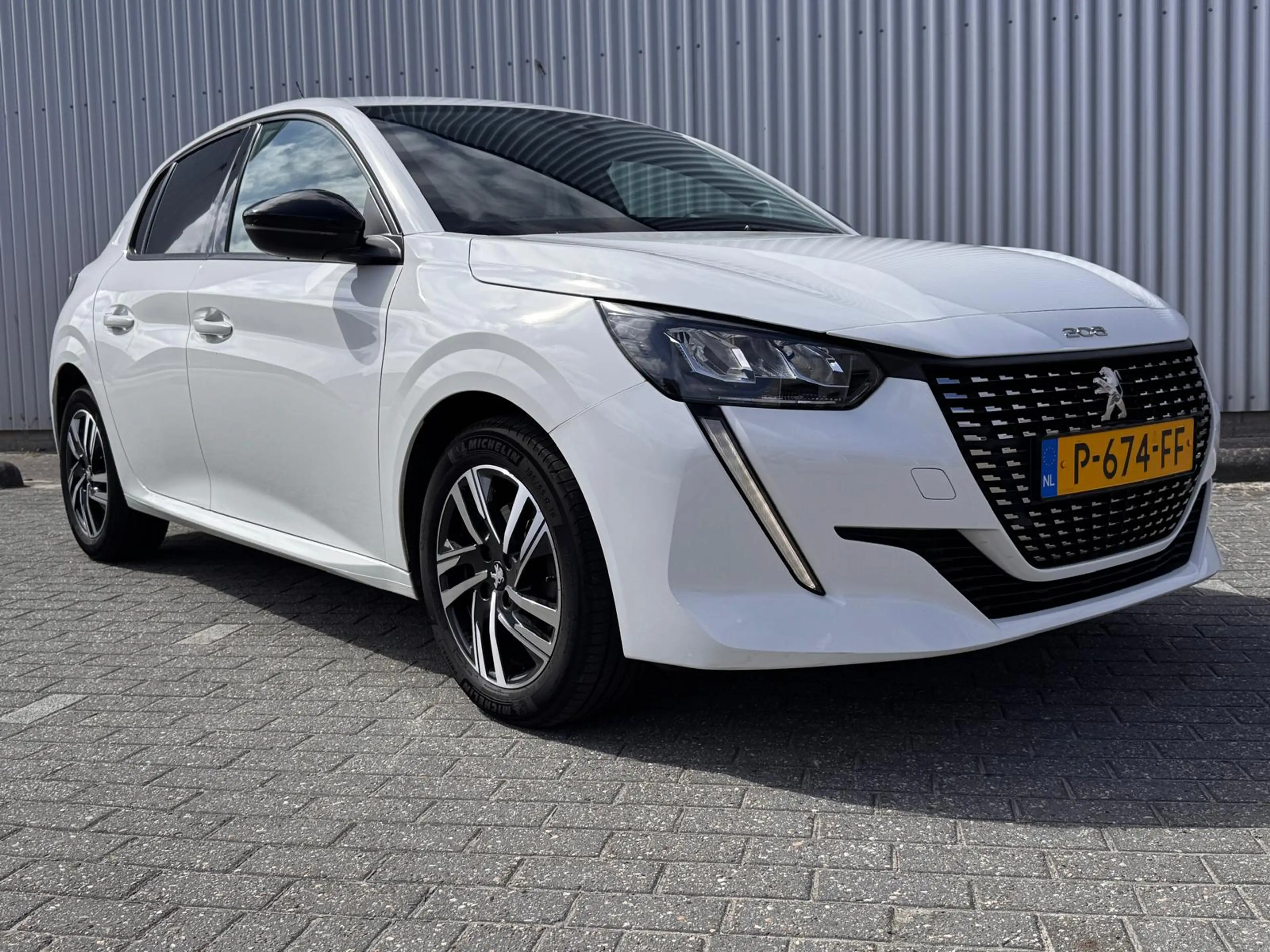 Peugeot 208 1.2 100PK Allure Automaat | Camera | Navigatie | A — photo 7