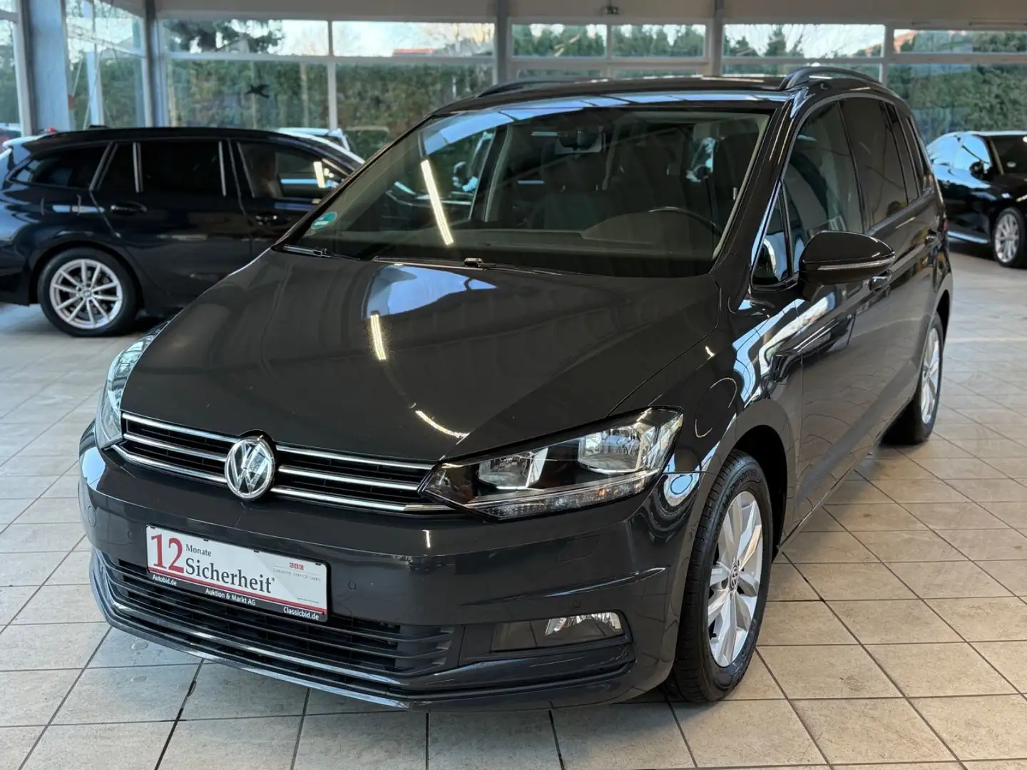 Volkswagen Touran 1.6 TDI BMT/1Hd./7-Sitzer/CarPlay/AHK/PDC Grau - 1