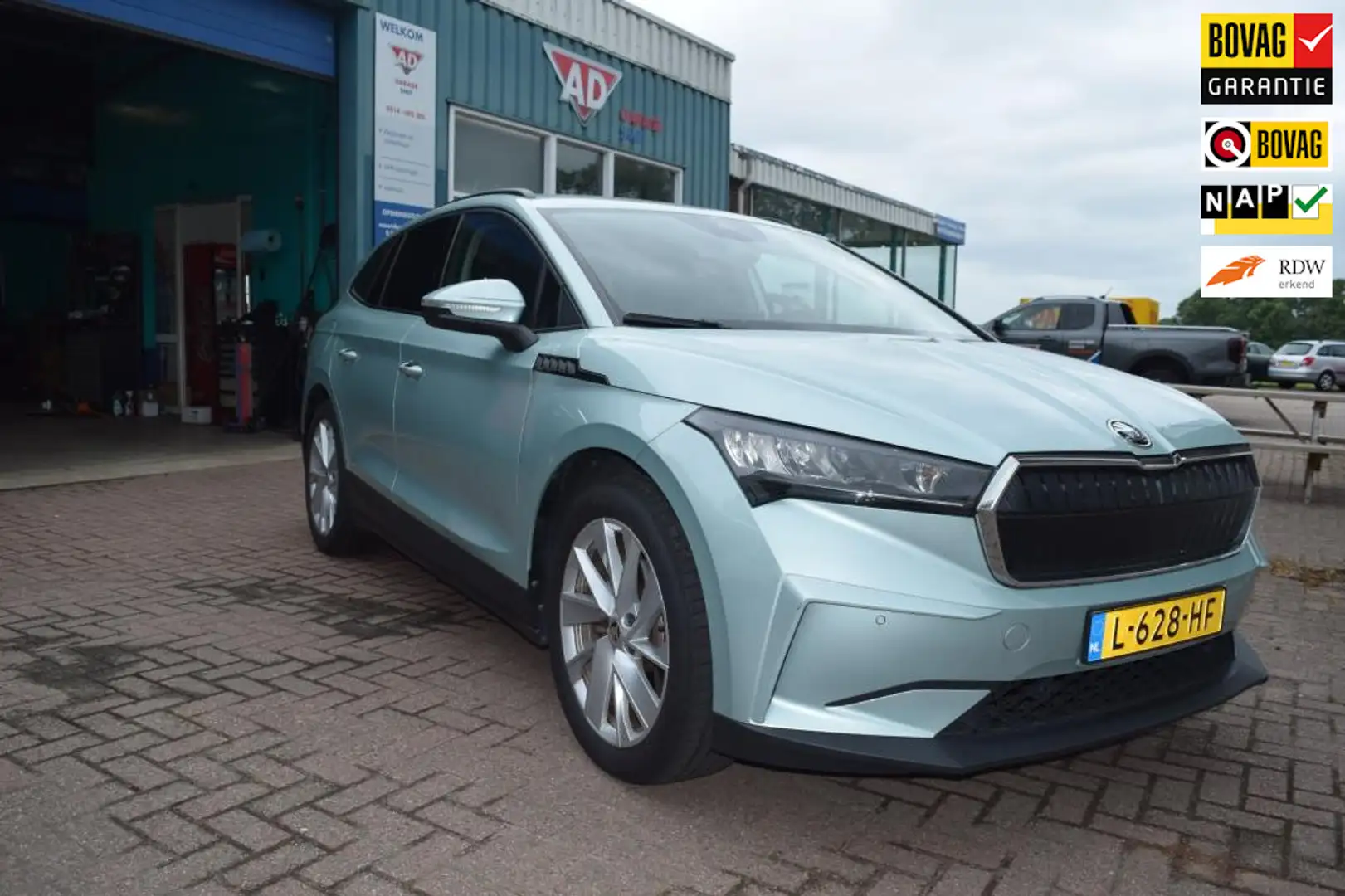 Skoda Enyaq iV 60 BOVAG GARANTIE Grijs - 1