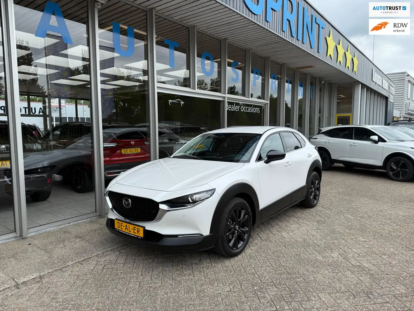 Mazda CX-30 2.5 e-SkyActiv-G M Hybrid Homura 140PK / NAVIGATIE Wit - 1