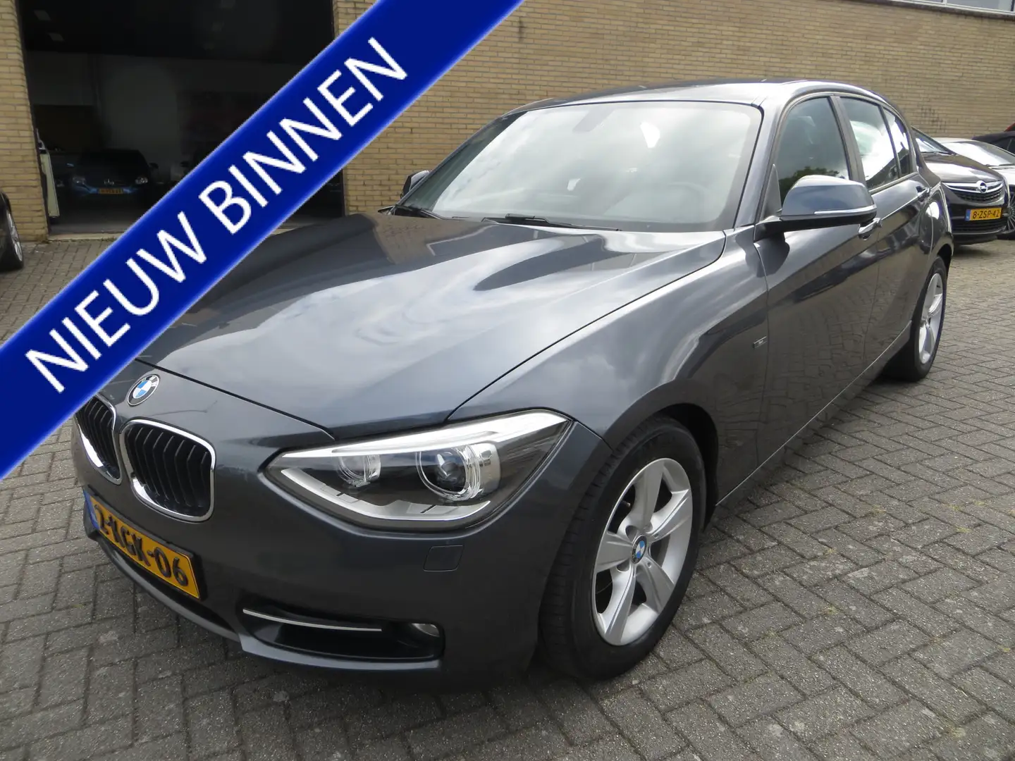 BMW 116 1-serie 116i EDE Business Sport NAVI NEDERL. NAP-G Gris - 1