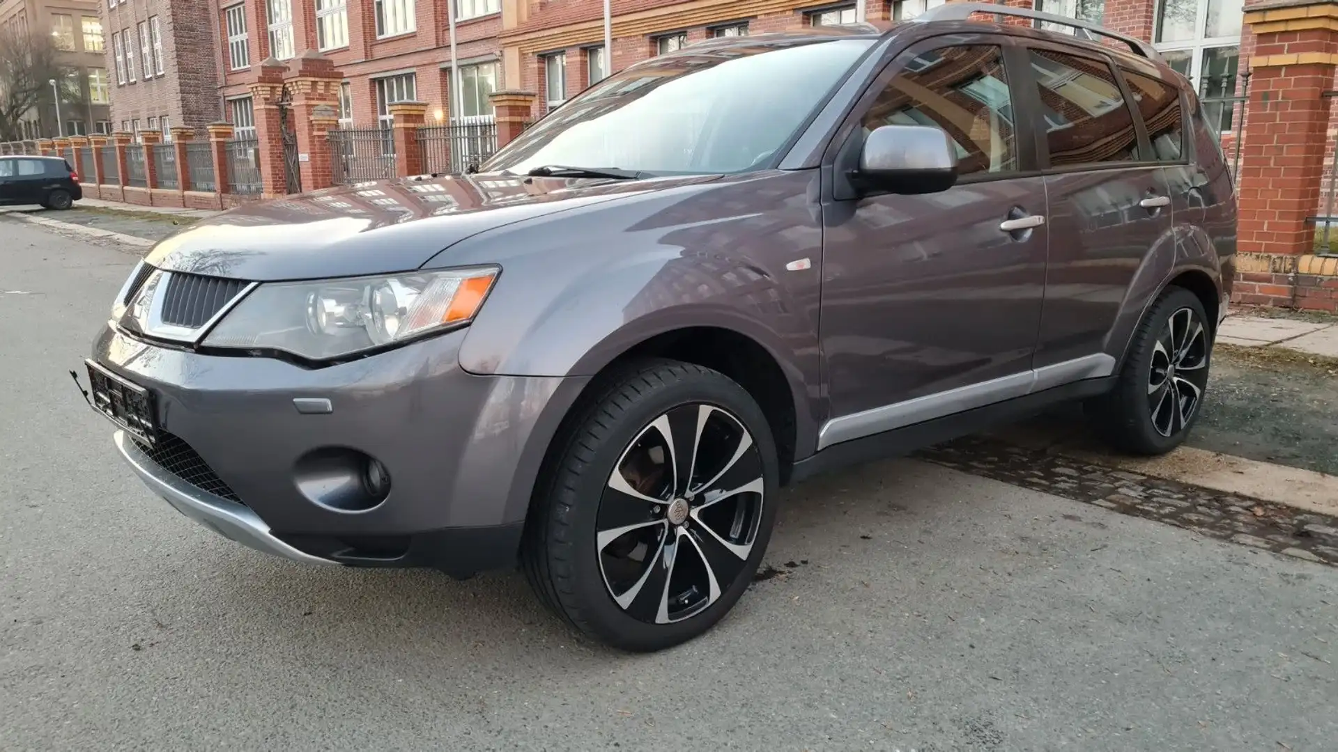 Mitsubishi Outlander 2.4 Intense*7 Sitze*Euro 4*8 fach bereift Grigio - 1