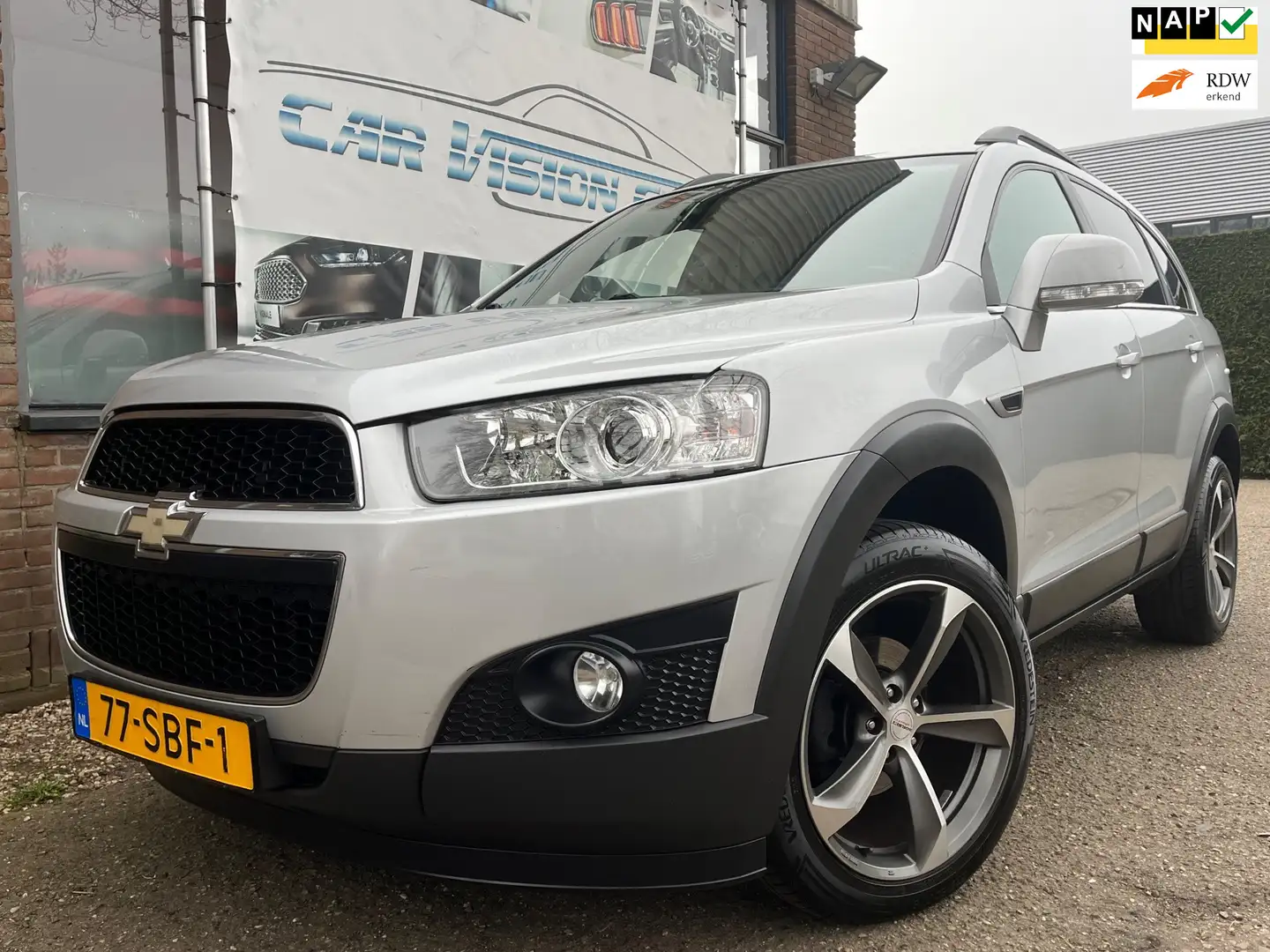 Chevrolet Captiva 2.4i LT 2WD|Trekhaak|Camera|Airco|7-persoons| Gris - 1