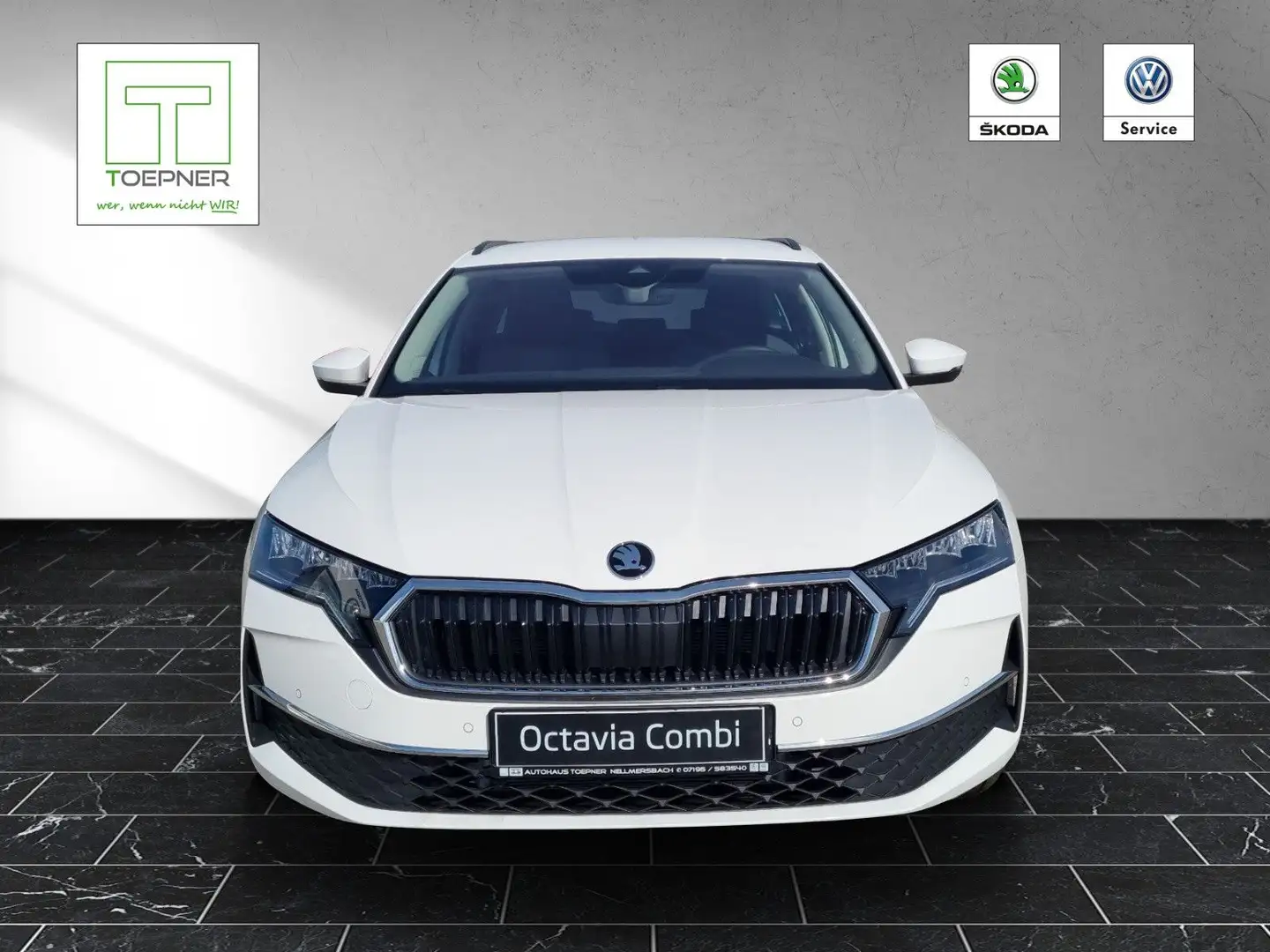Skoda Octavia Combi 2.0 TDI 110 kW Tour AHK Wit - 1
