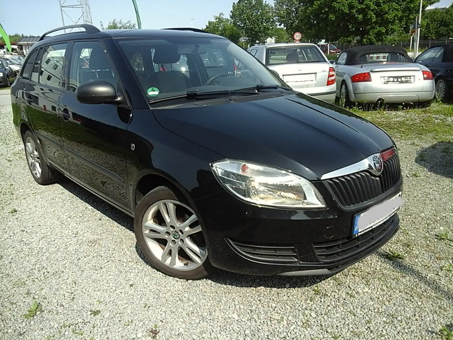 Skoda Fabia Cool Edition 2011/scheckh./ ALU+Klima+ZV+PDC/m.TUV Schwarz - 1