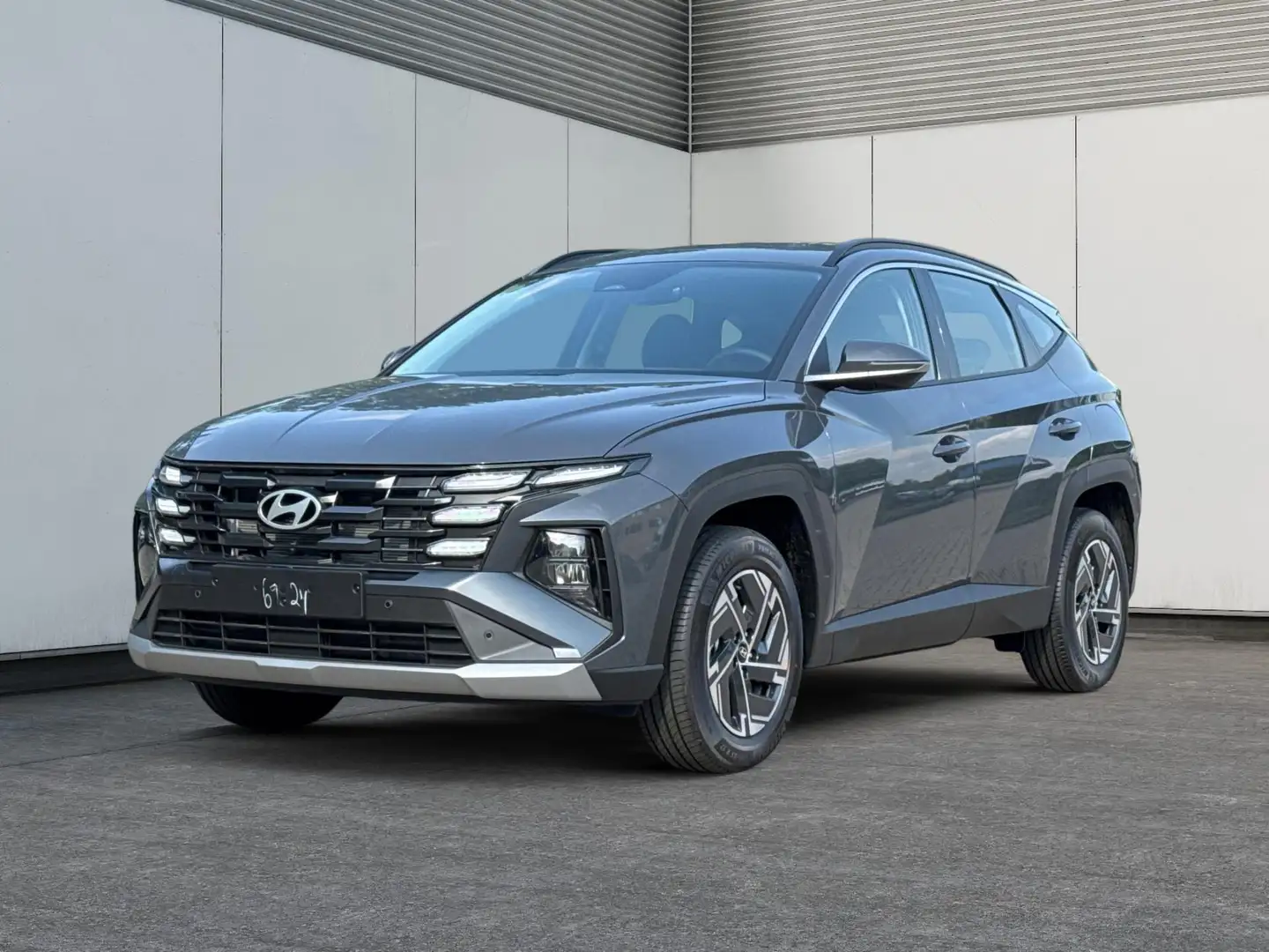 Hyundai TUCSON Style NAVI+KAMERA+SHZ+LED+TEMPOMAT+17" ALU+PDC ... Grau - 1