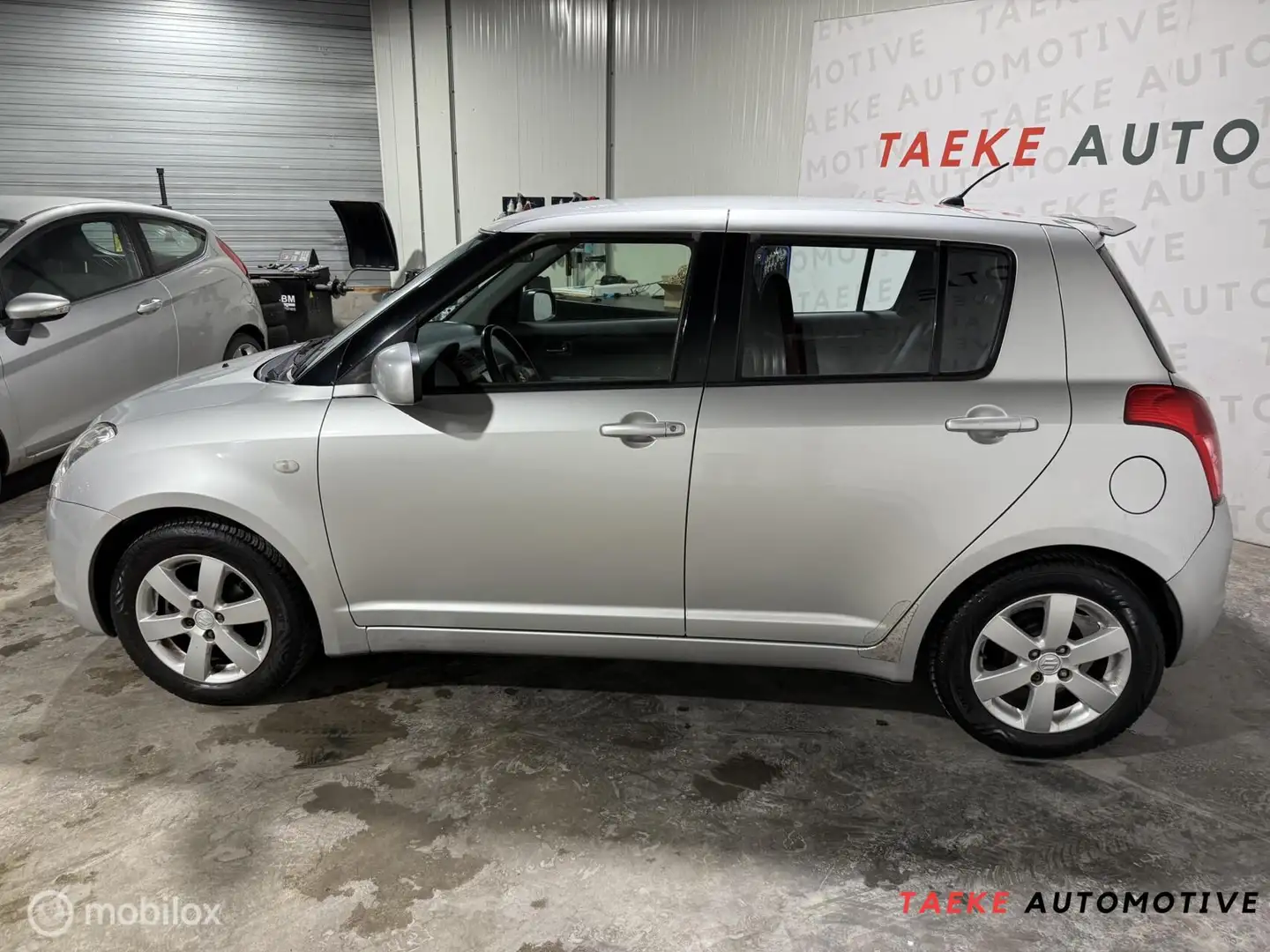Suzuki Swift 1.3 Shogun Airco/Apk/2e EIG/Nap Grijs - 2