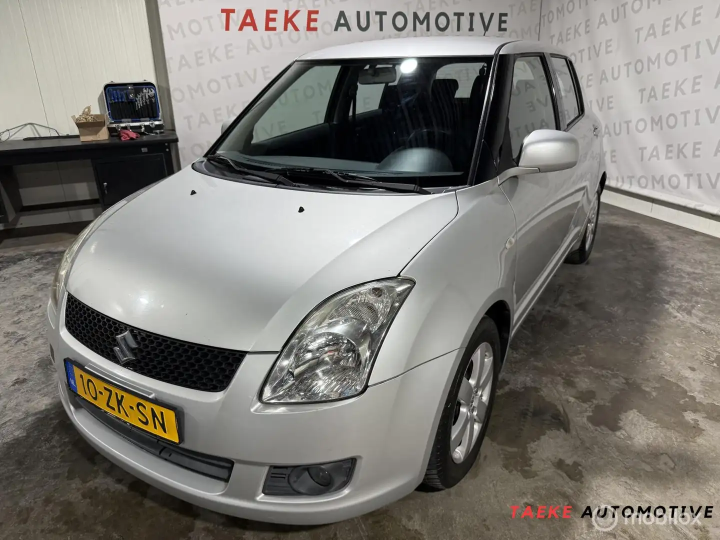 Suzuki Swift 1.3 Shogun Airco/Apk/2e EIG/Nap Grijs - 1