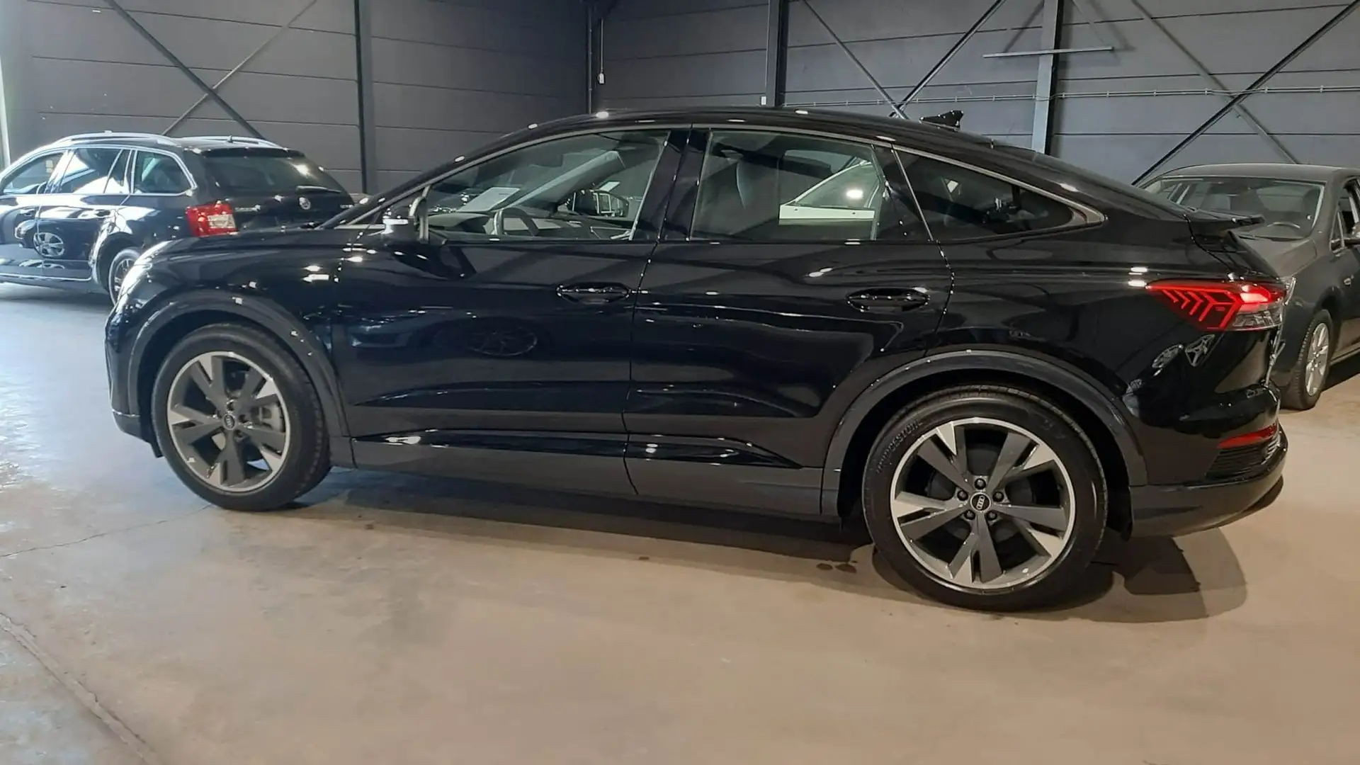 Audi Q4 e-tron 40 Sportback S-Line in topstaat Noir - 2