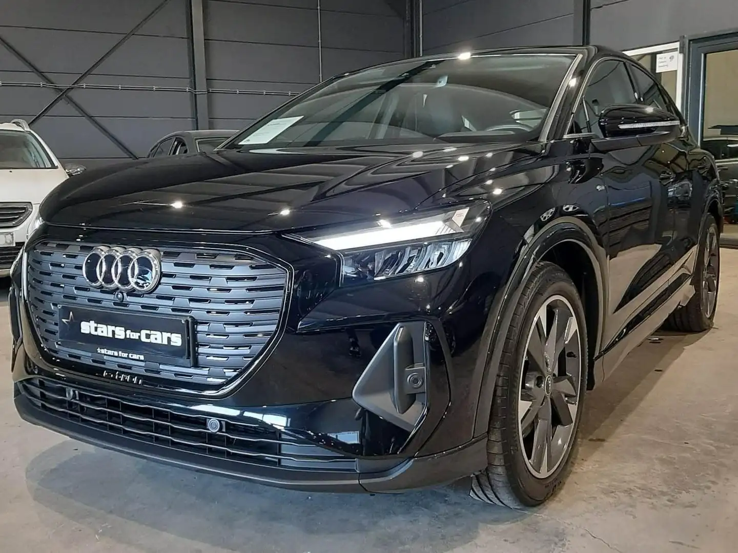 Audi Q4 e-tron 40 Sportback S-Line in topstaat Noir - 1