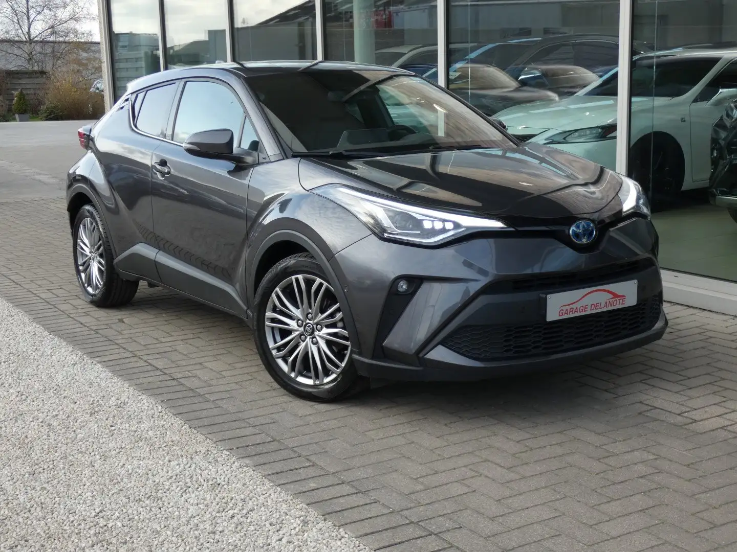 Toyota C-HR 1.8i HYBRID C-HIC+LEDER +Trekhaak +Zetelverwarming Gris - 1