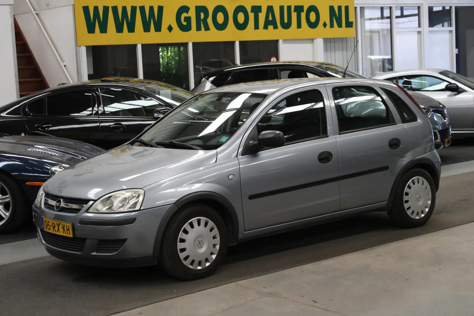 Opel Corsa 1.2-16V Essentia NAP, Airco, Stuurbekrachtiging Grijs - 1