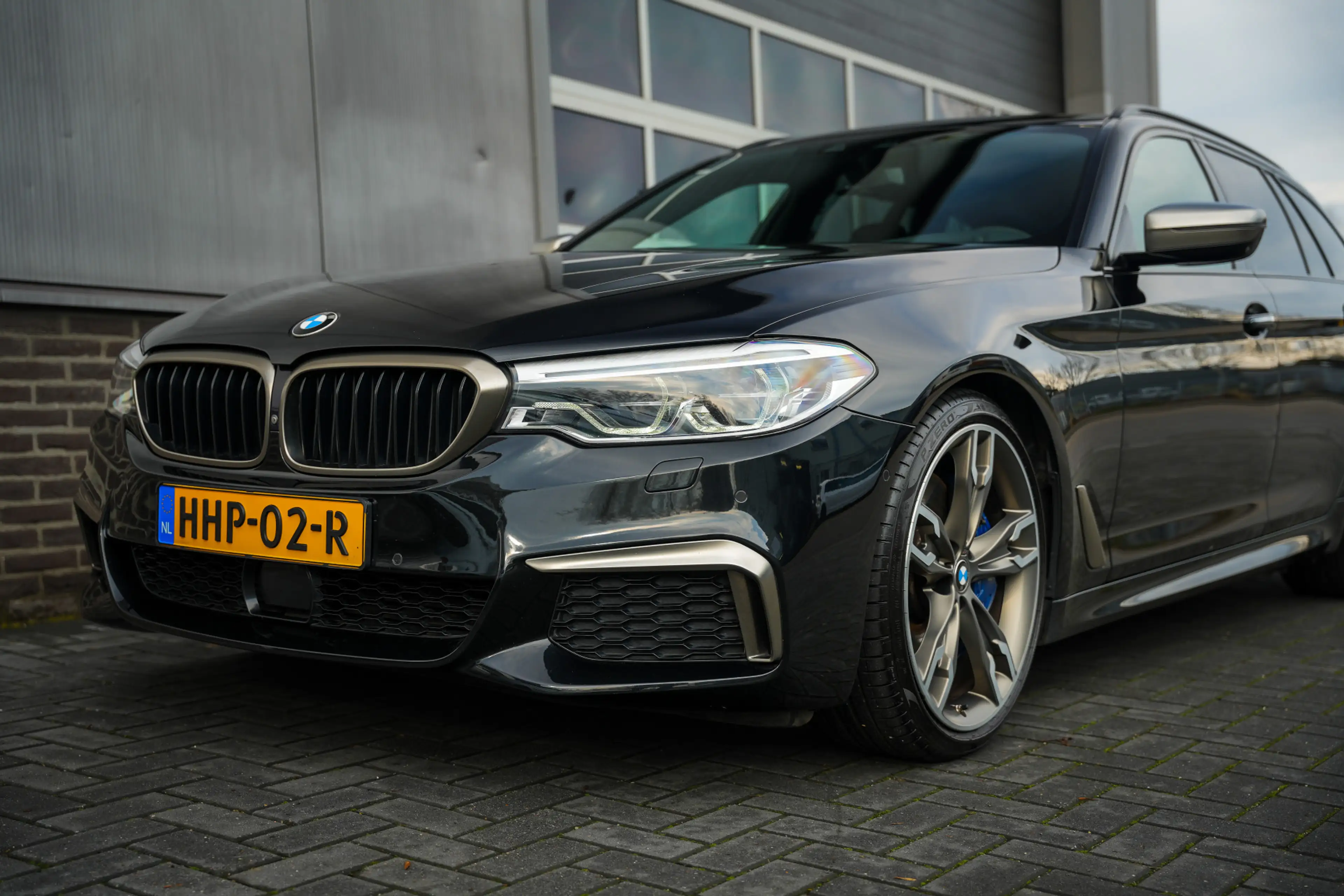 BMW M550 5-serie Touring M550d 400pk xDrive High Executive — photo 9