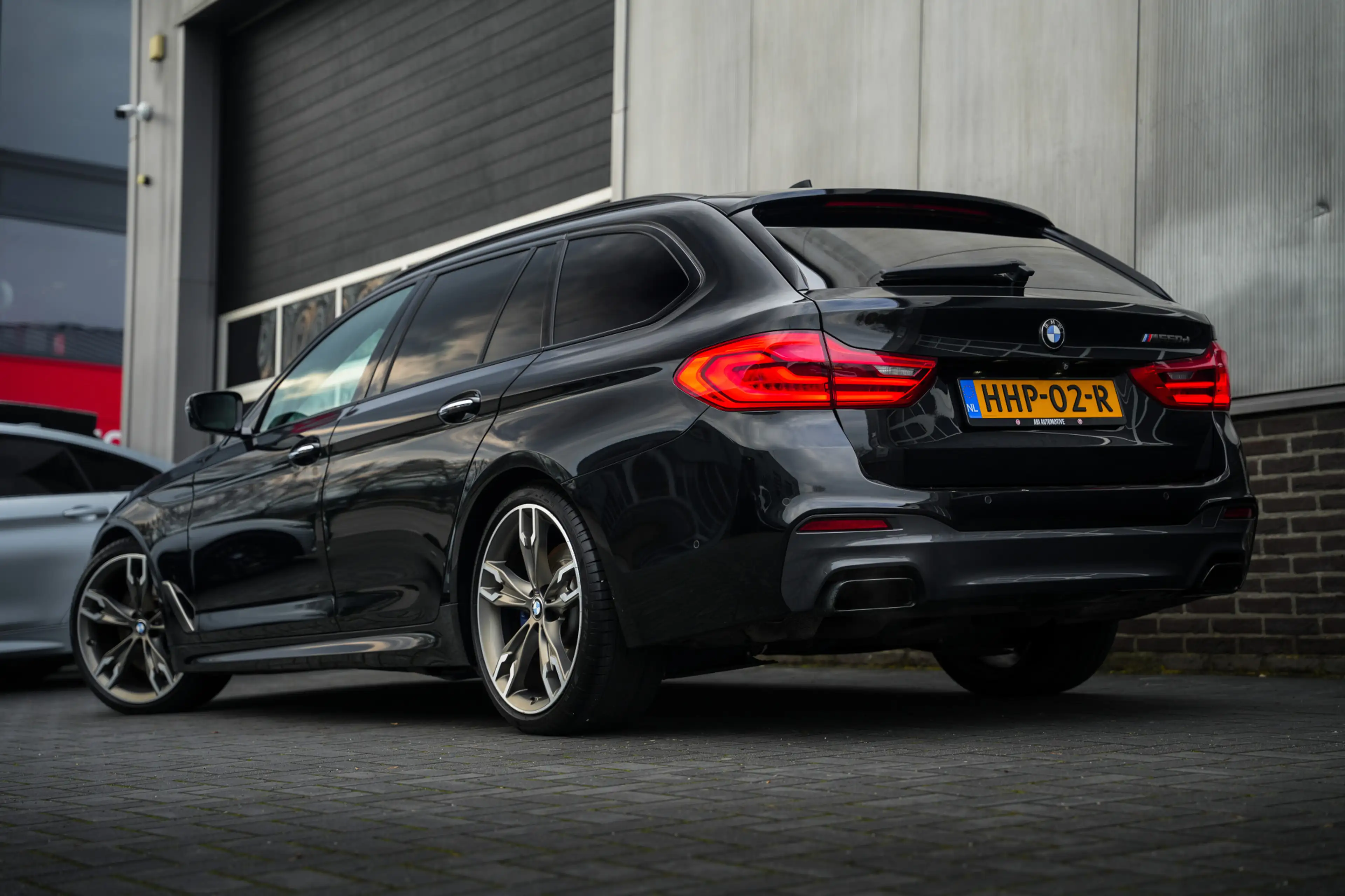 BMW M550 5-serie Touring M550d 400pk xDrive High Executive — photo 6