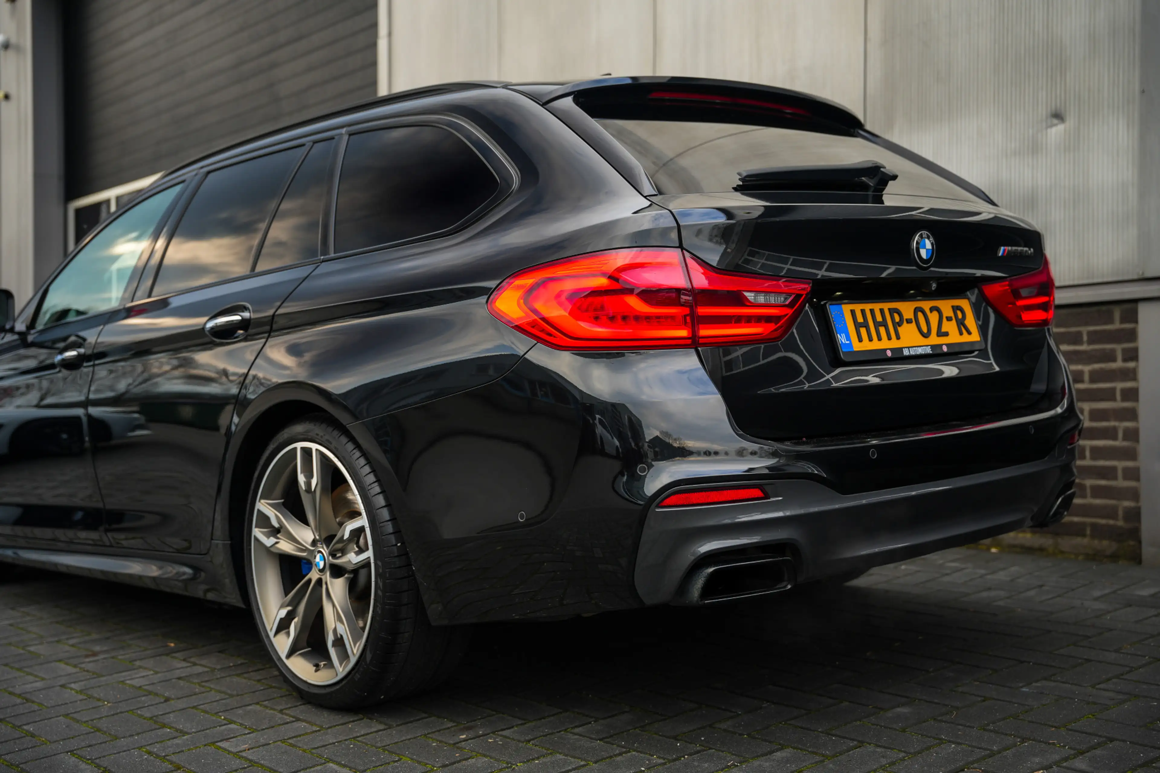 BMW M550 5-serie Touring M550d 400pk xDrive High Executive — photo 10