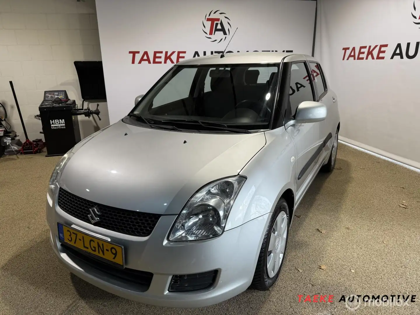 Suzuki Swift 1.3 Cool Airco/Nap/1eEIG/Dealer onderhouden Grijs - 1