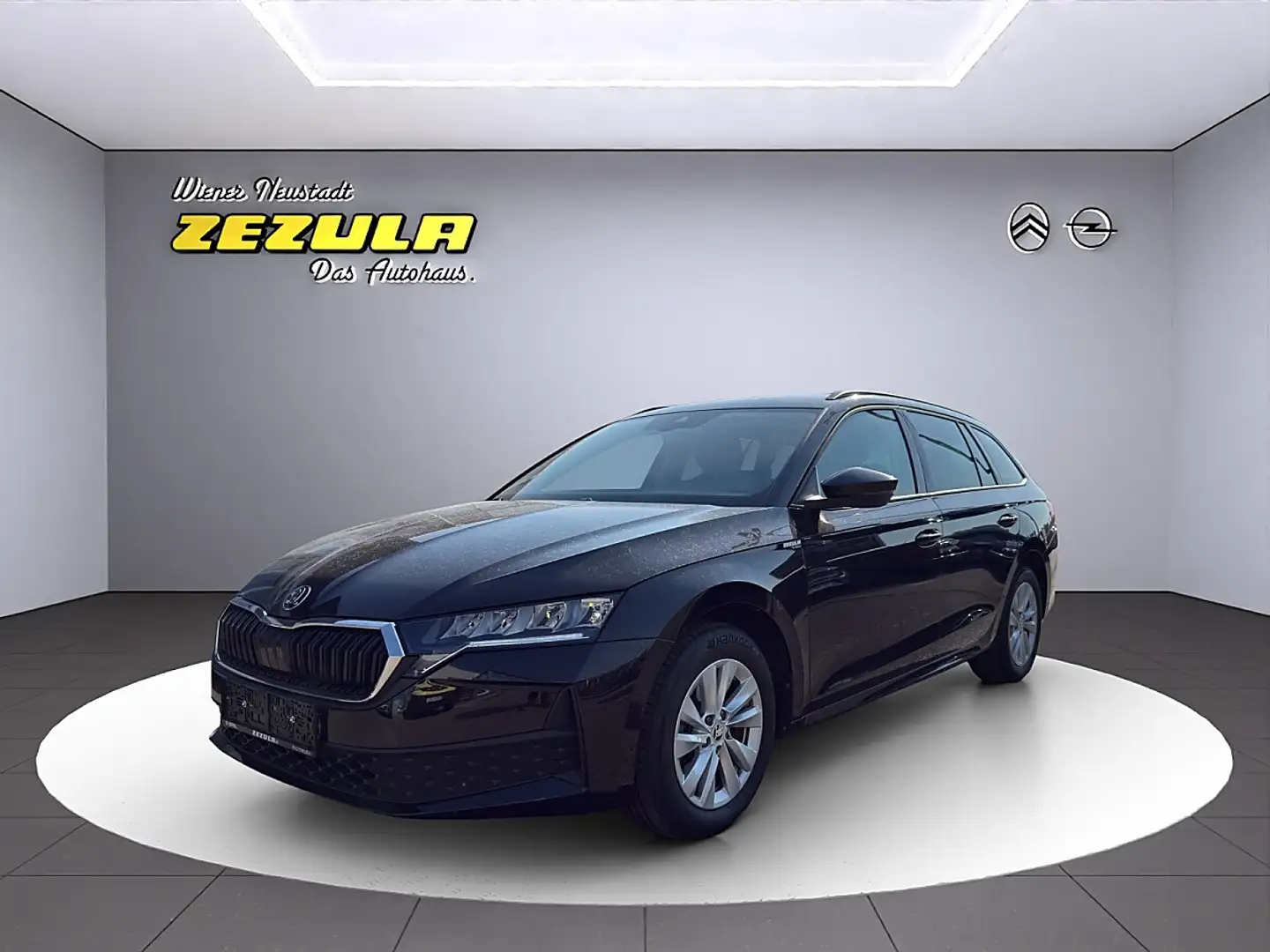 Skoda Octavia Kombi 1,5 TSI mHEV Essence DSG Schwarz - 1