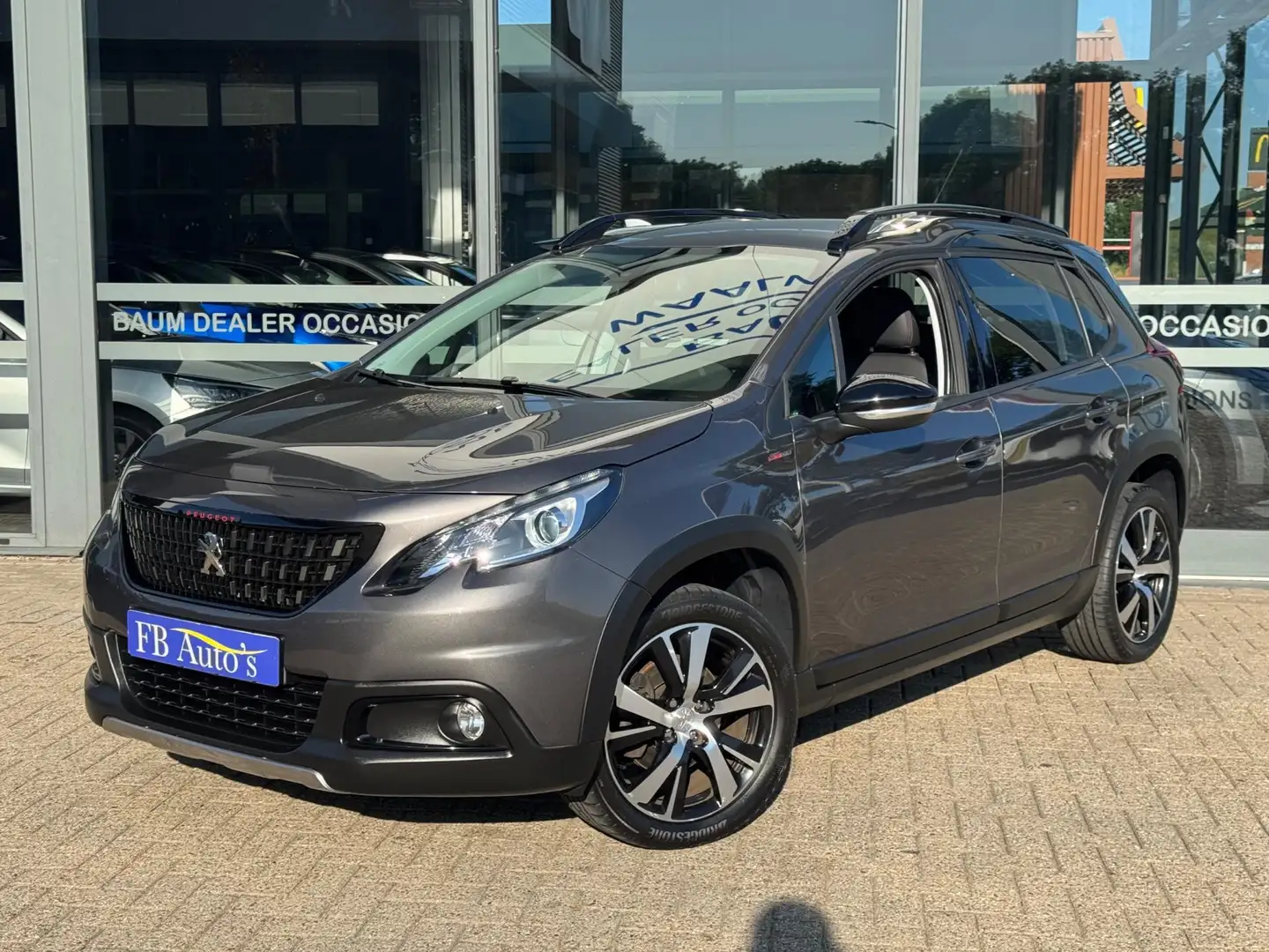 Peugeot 2008 1.2 PureTech GT-Line Airco Cruise Navi Lmv A.Camer Grijs - 1