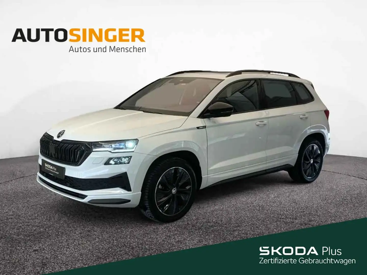 Skoda Karoq Sportline TSI DSG 4x4 *AHK*PANO*MATRIX*NAV Weiß - 1