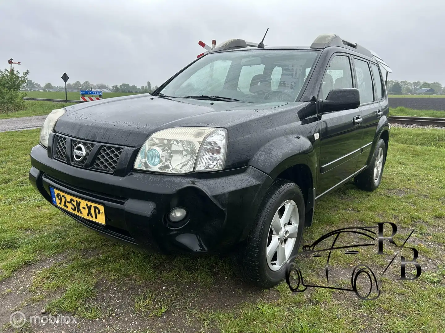 Nissan X-Trail 2.5 Sport 4 Wheel drive EXPORTPRIJS Zwart - 1