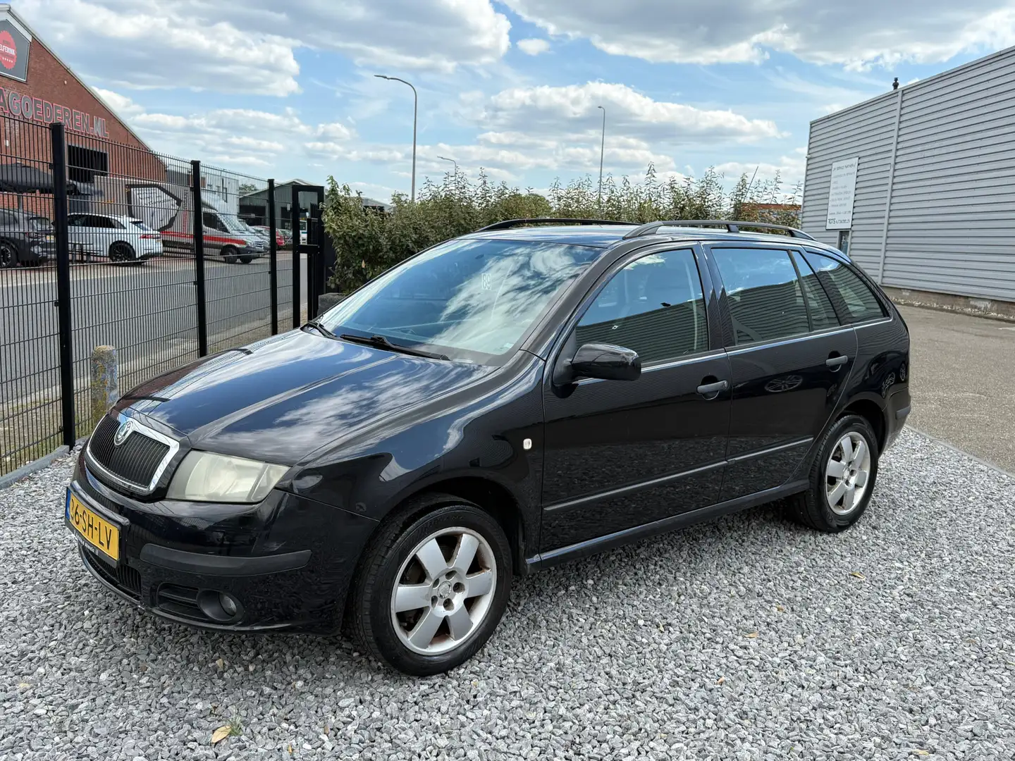 Skoda Fabia Combi 1.4-16V Equipe plus Airco|Cruis|PDC Zwart Negro - 1