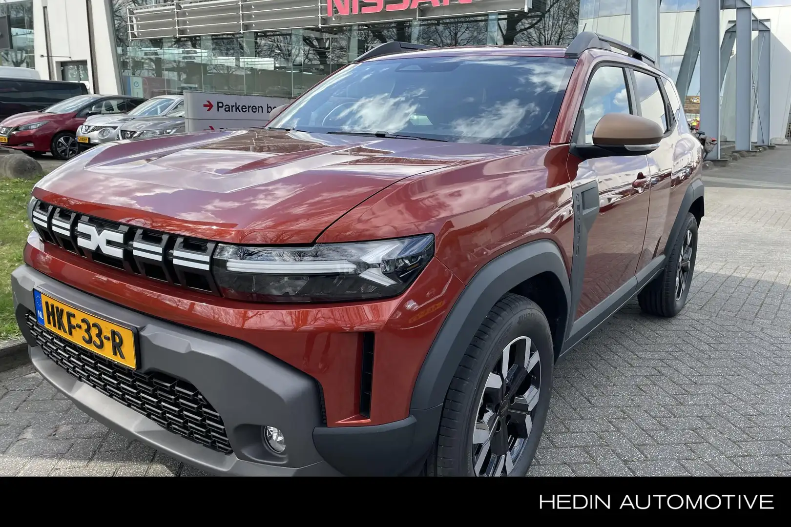Dacia Duster 1.6 Hybrid 140 Extreme Techno Pack + NAV Live Bruin - 1