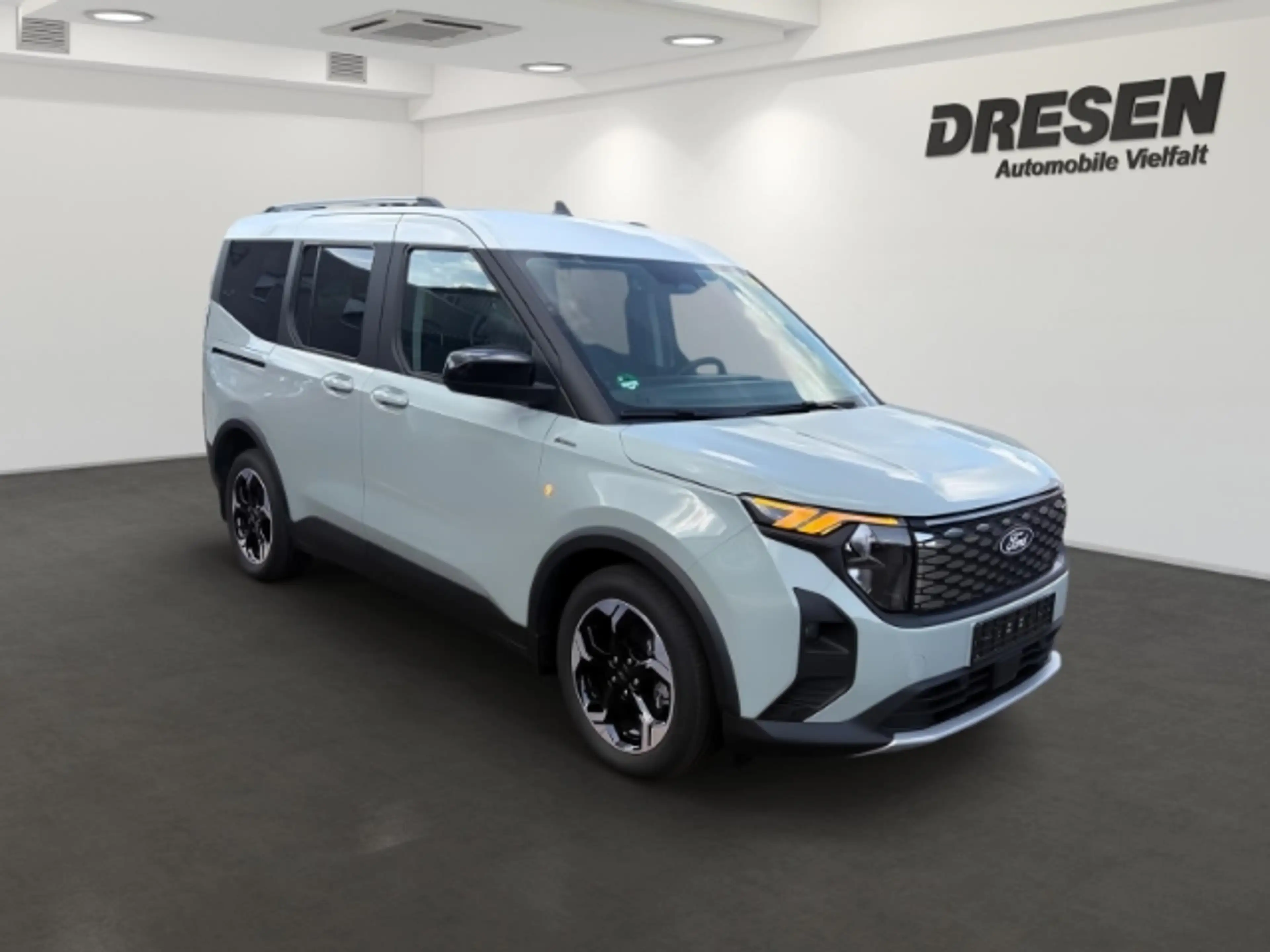 Ford Tourneo Courier BEV Active + Winterpaket 2 + Dach in weiß + Rückfa — photo 3