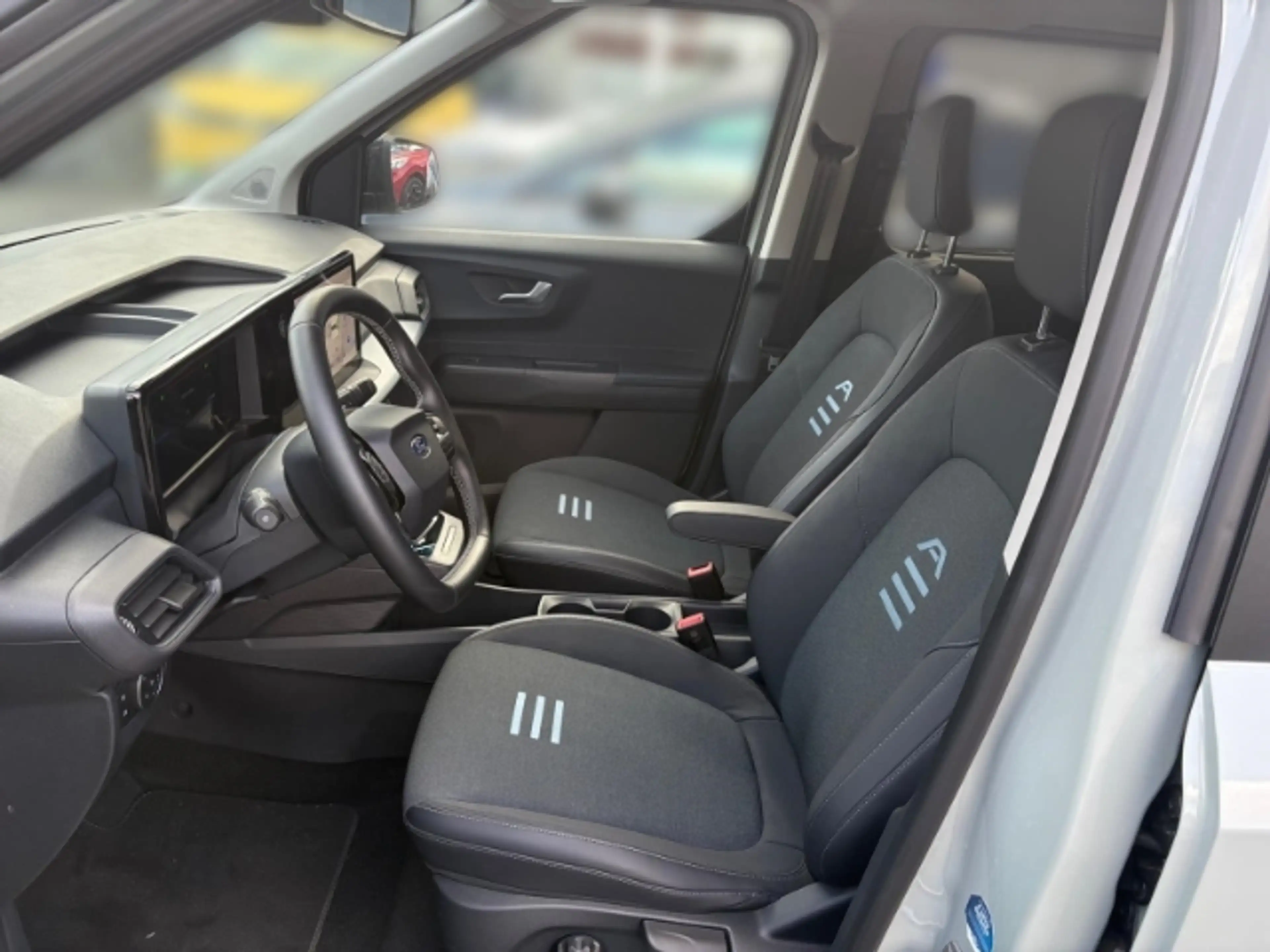 Ford Tourneo Courier BEV Active + Winterpaket 2 + Dach in weiß + Rückfa — photo 8