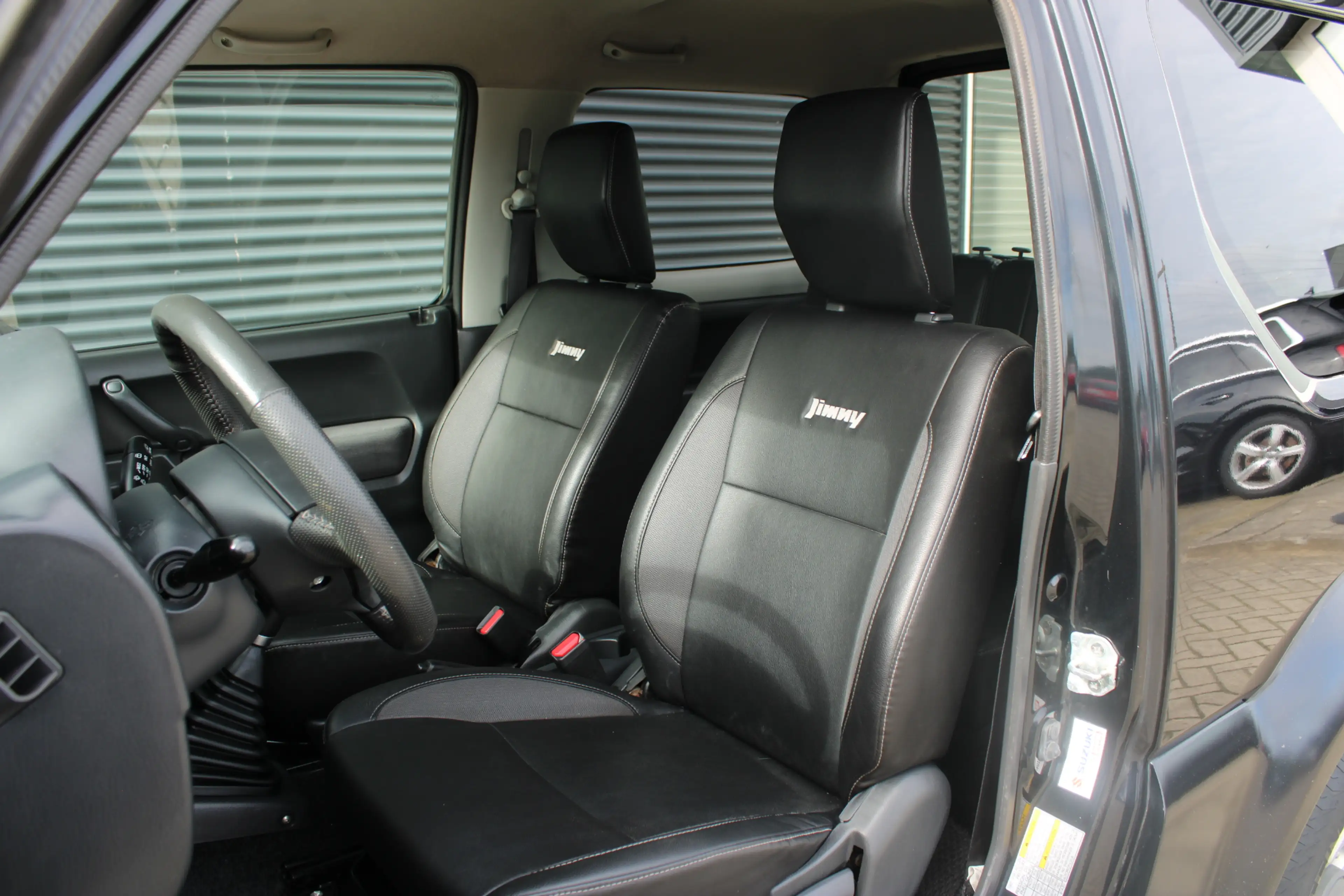 Suzuki Jimny 1.3 Exclusive 4x4 Vol-Leder Stoelverwarming Airco — photo 11