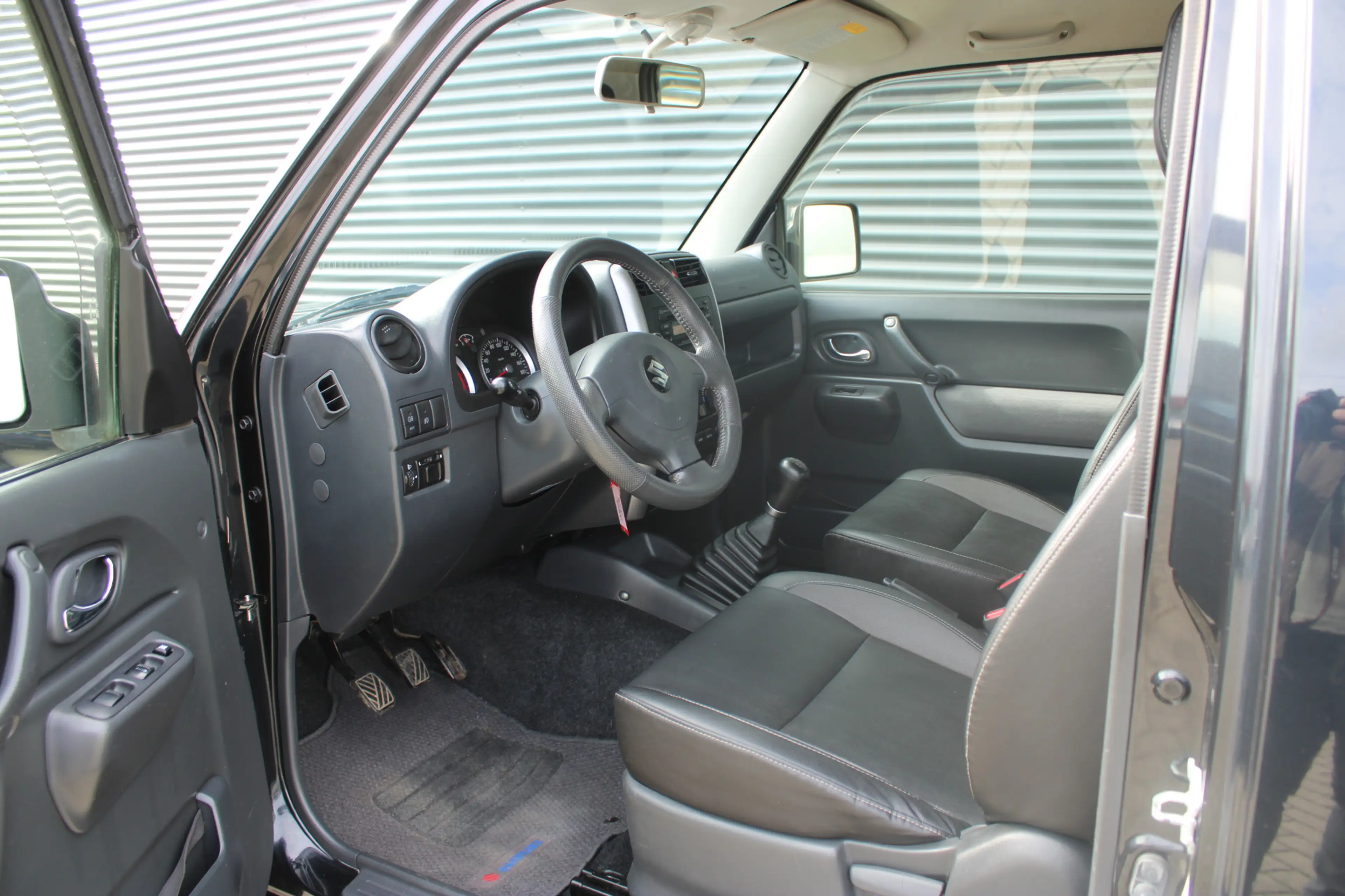 Suzuki Jimny 1.3 Exclusive 4x4 Vol-Leder Stoelverwarming Airco — photo 10