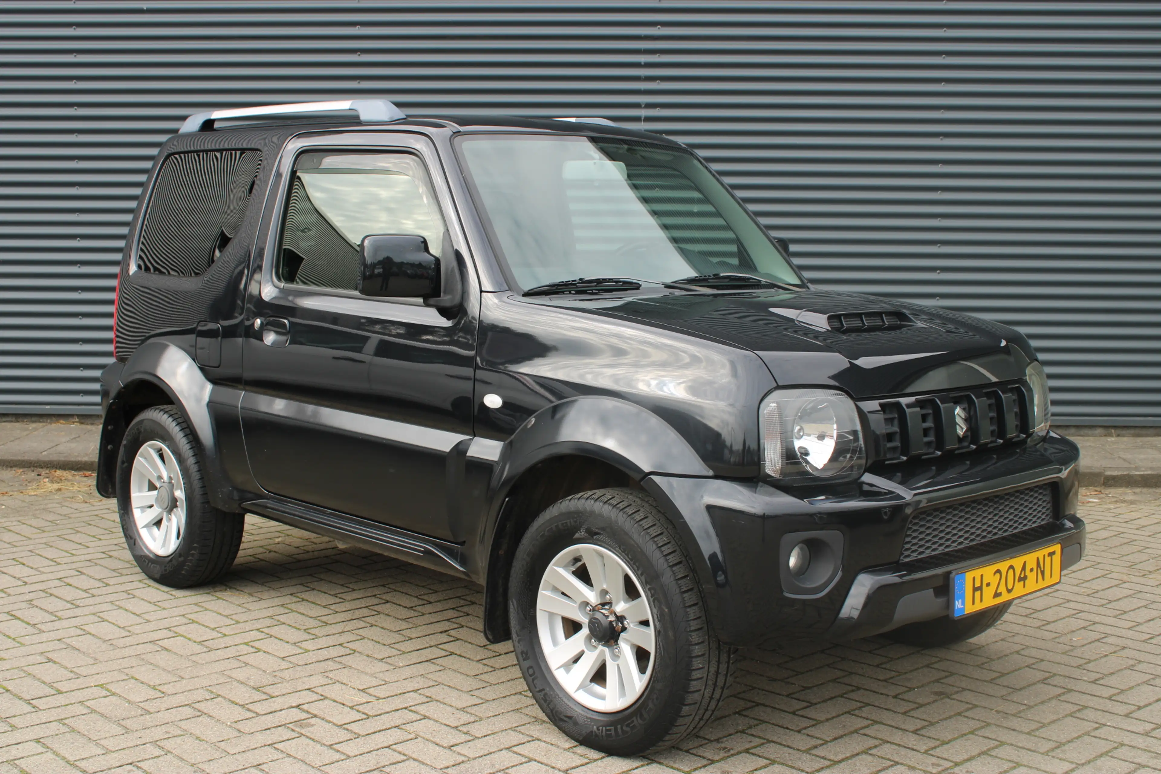 Suzuki Jimny 1.3 Exclusive 4x4 Vol-Leder Stoelverwarming Airco — photo 7