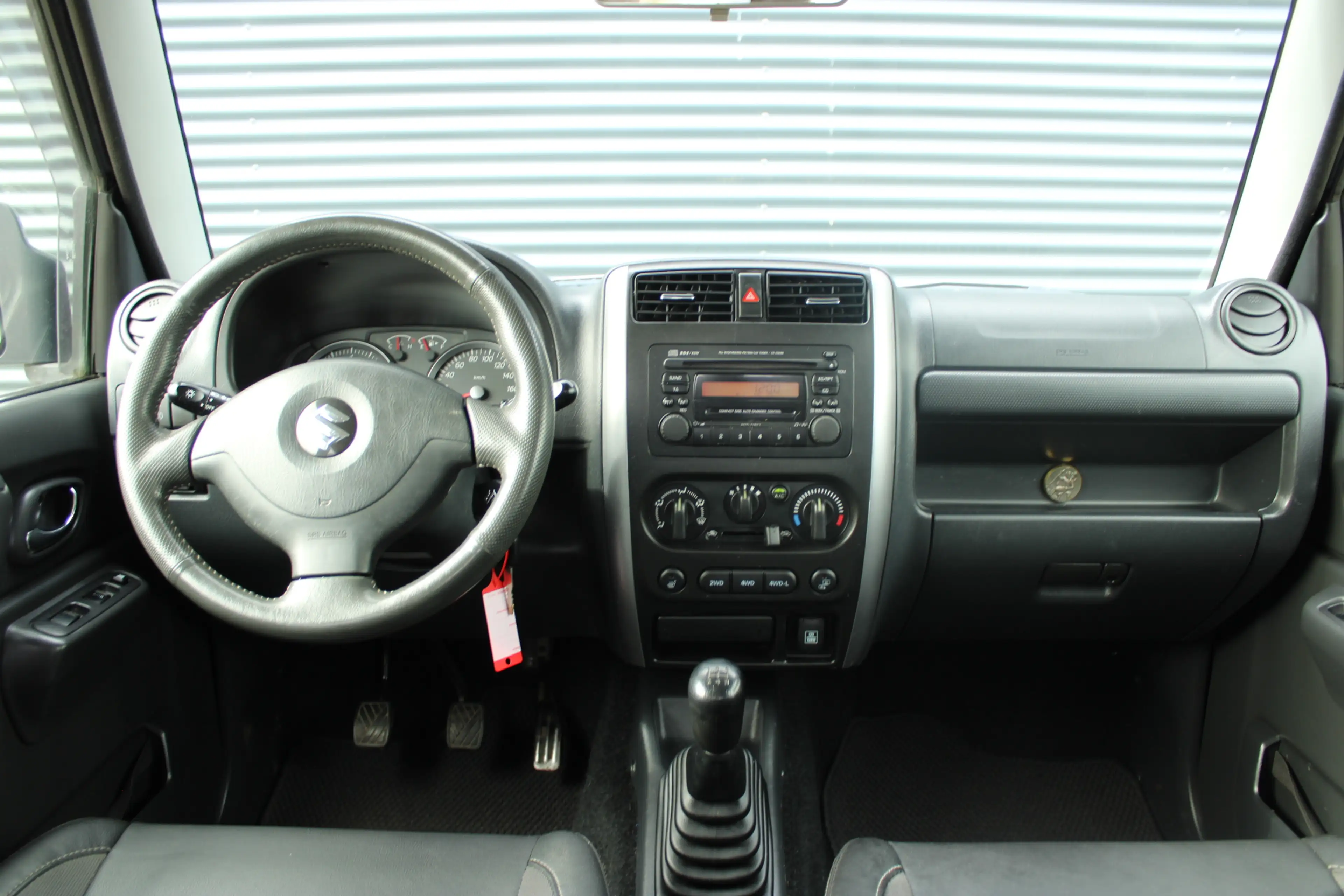 Suzuki Jimny 1.3 Exclusive 4x4 Vol-Leder Stoelverwarming Airco — photo 9