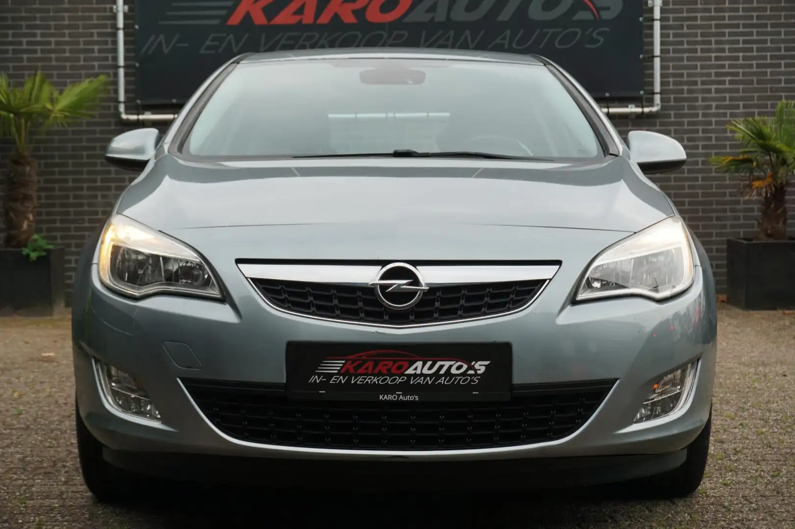 Opel Astra 1.6 Cosmo AUT Leer Clima Cruise Elek Rmn Trekh Lm Grijs - 2