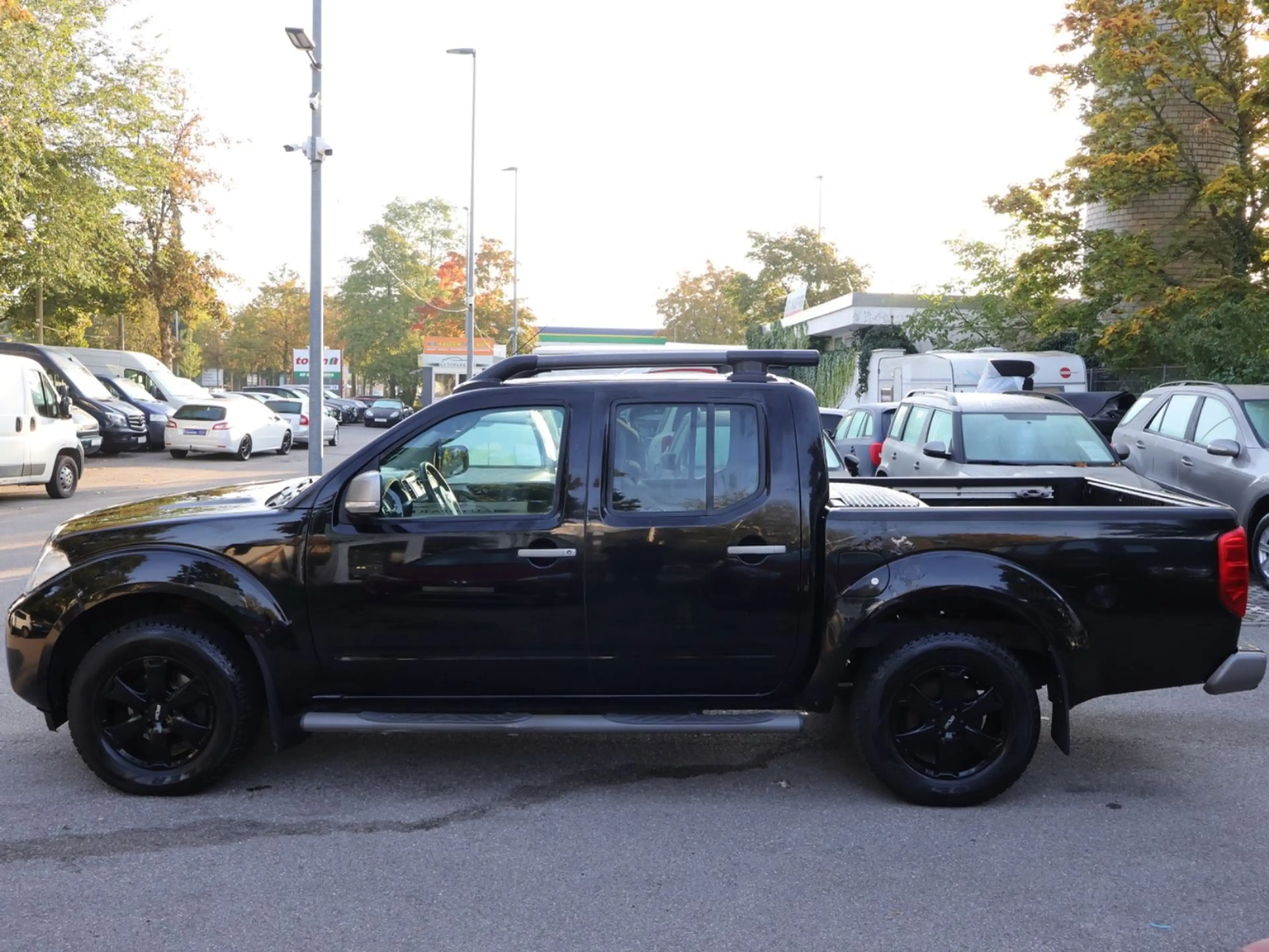 Nissan Navara Double Cab PLATINUM EVO 4X4 LB 2.5 dCi — photo 8