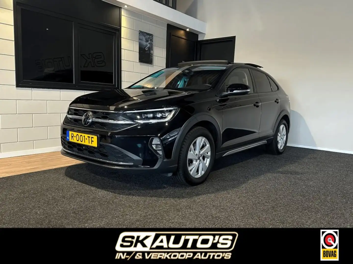 Volkswagen Taigo 1.0 TSI LIFE BNS NAP l PANO l STOELVERW l LED l AC Schwarz - 1