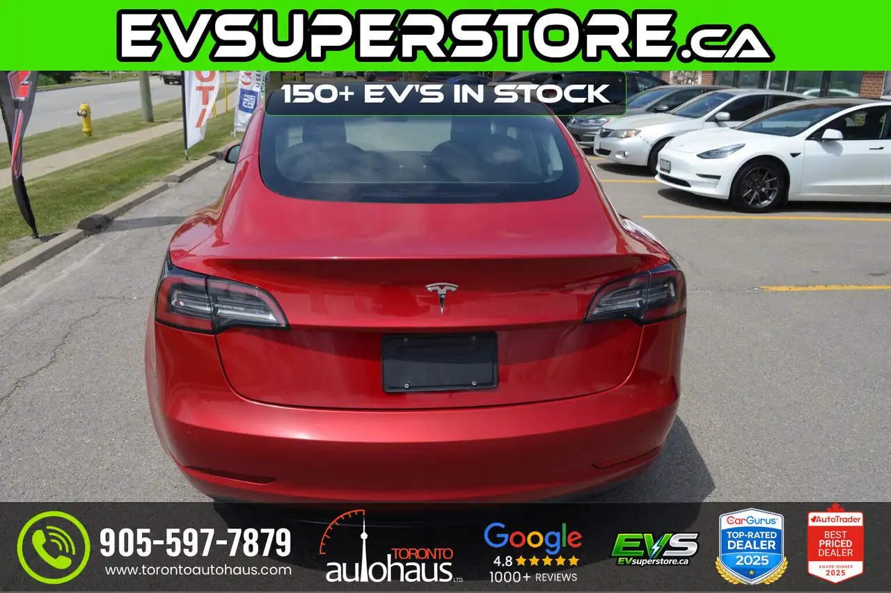 Tesla Model 3 photo Tesla Model 3