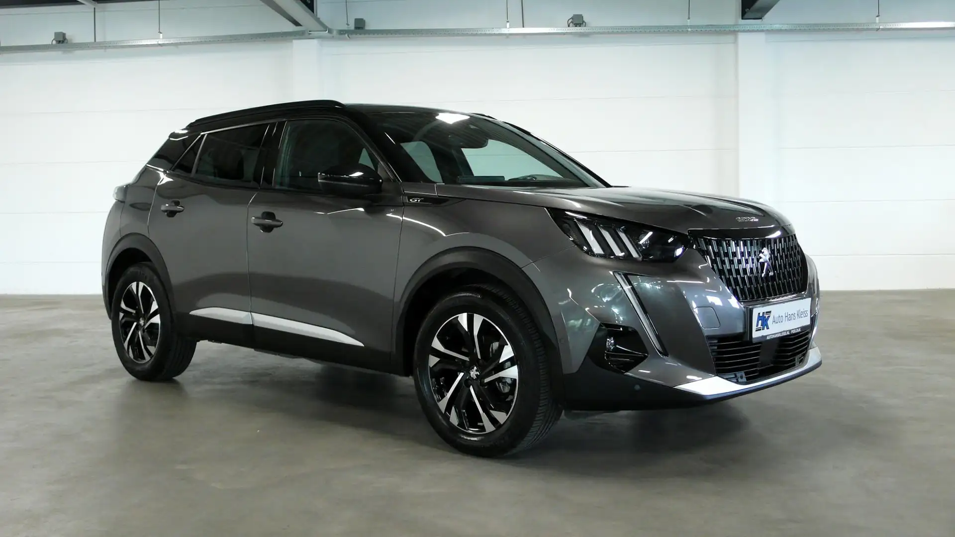 Peugeot 2008 1.2 PureTech GT | Pano dak | Leder | 1e eigenaar Gris - 1