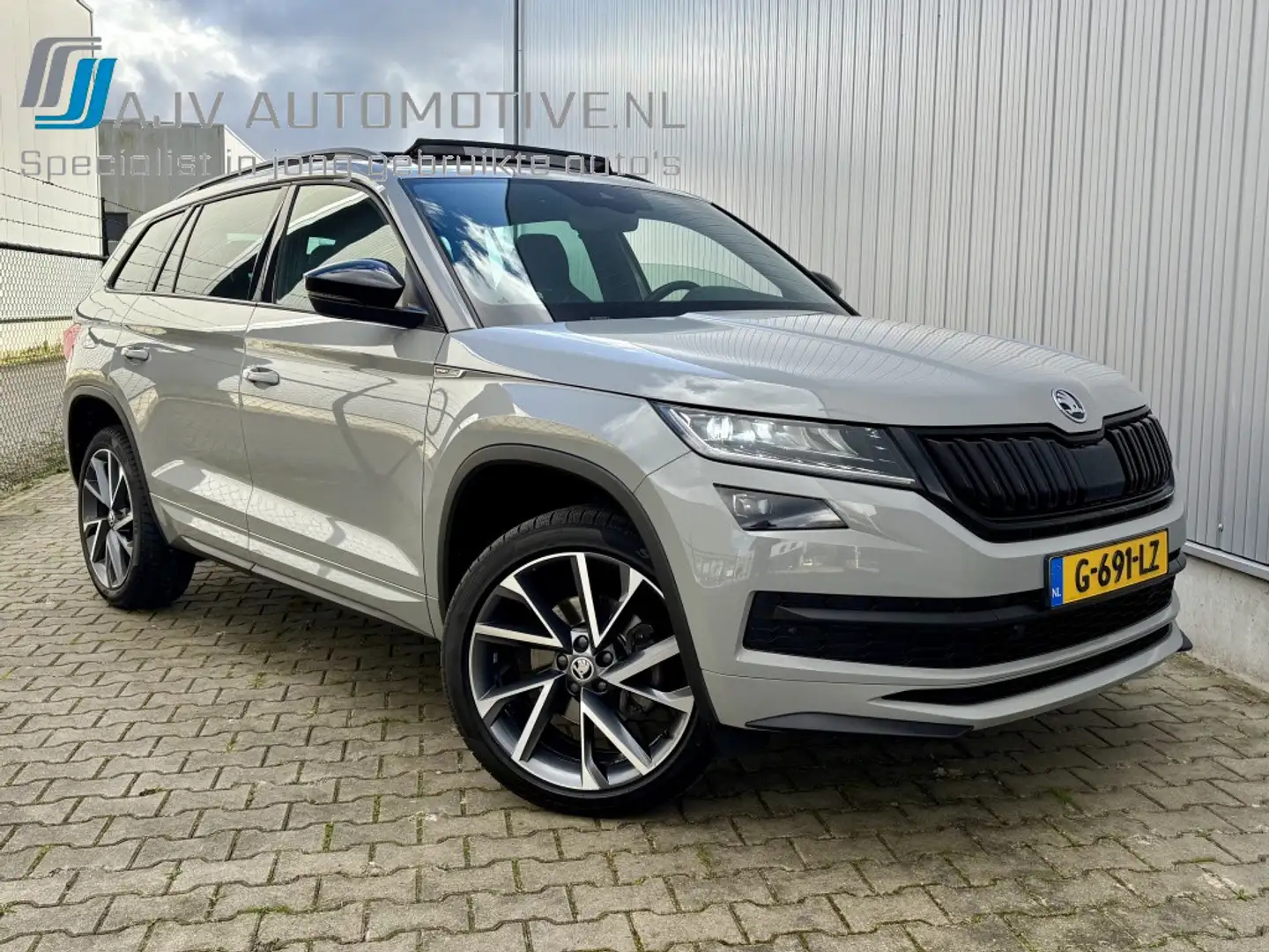 Skoda Kodiaq 1.5 TSI AUT SPORTLINE 7 PERS. STEELGREY PANODAK Gris - 1