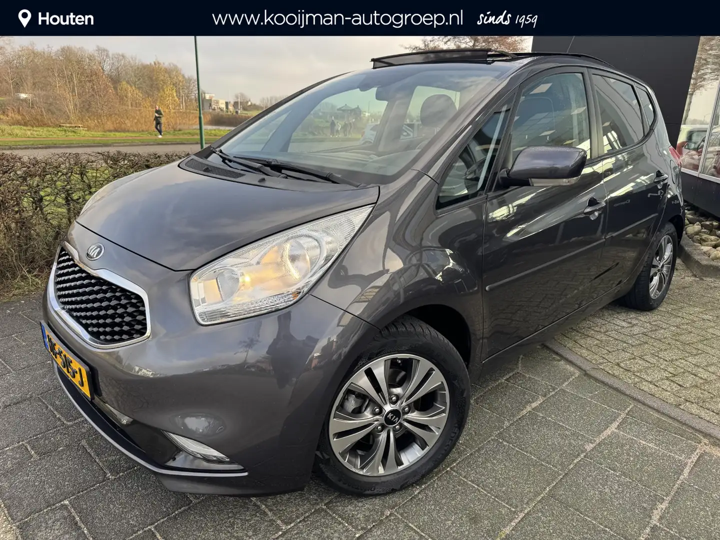 Kia Venga 1.4 CVVT ExecutiveLine Dealeronderhouden, Eerste E Gris - 1