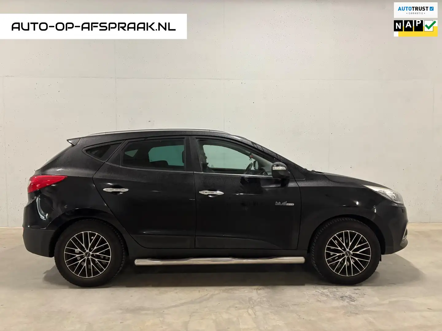 Hyundai iX35 1.6i GDI i-Catcher Trekhaak Navi Pano Camera Zwart - 1