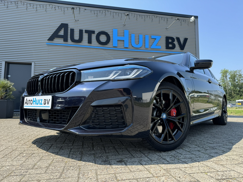 BMW 530 5-serie Touring 530e High Executive M Sport Panora — photo 44