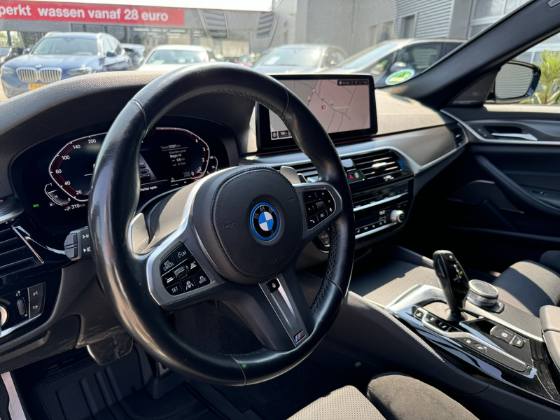 BMW 530 5-serie Touring 530e High Executive M Sport Panora — photo 12