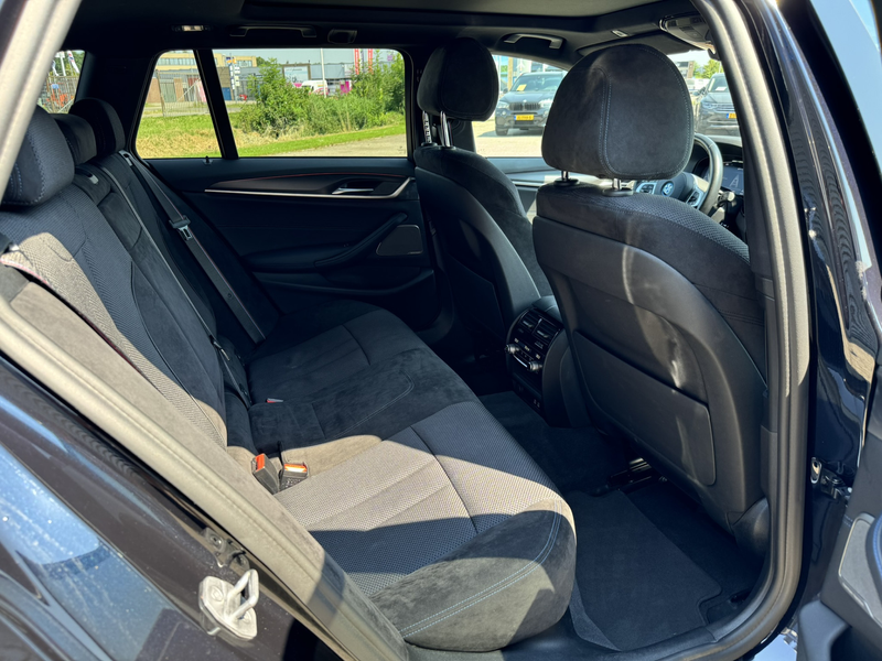 BMW 530 5-serie Touring 530e High Executive M Sport Panora — photo 33