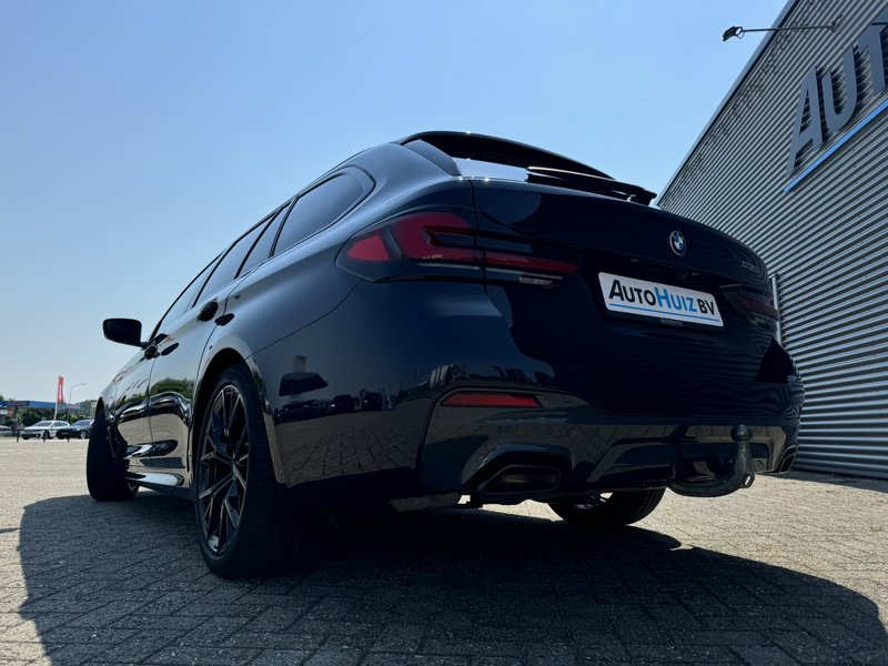 BMW 530 5-serie Touring 530e High Executive M Sport Panora — photo 45